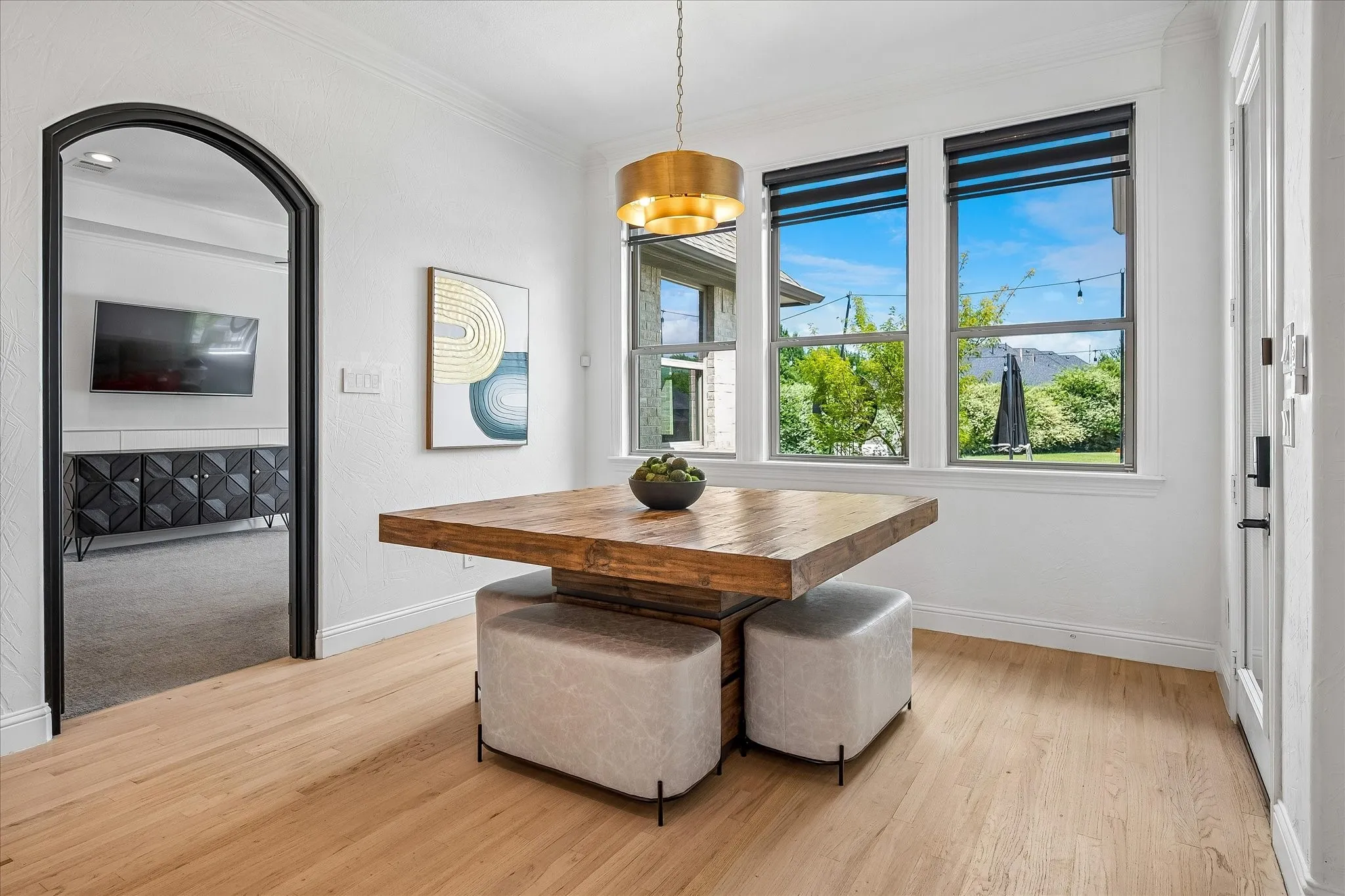 Breakfast nook overlooks beautiful pool and spa.