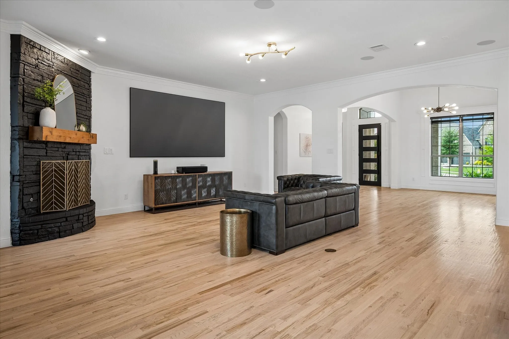Living Room has corner fireplace allowing for perfect TV wall