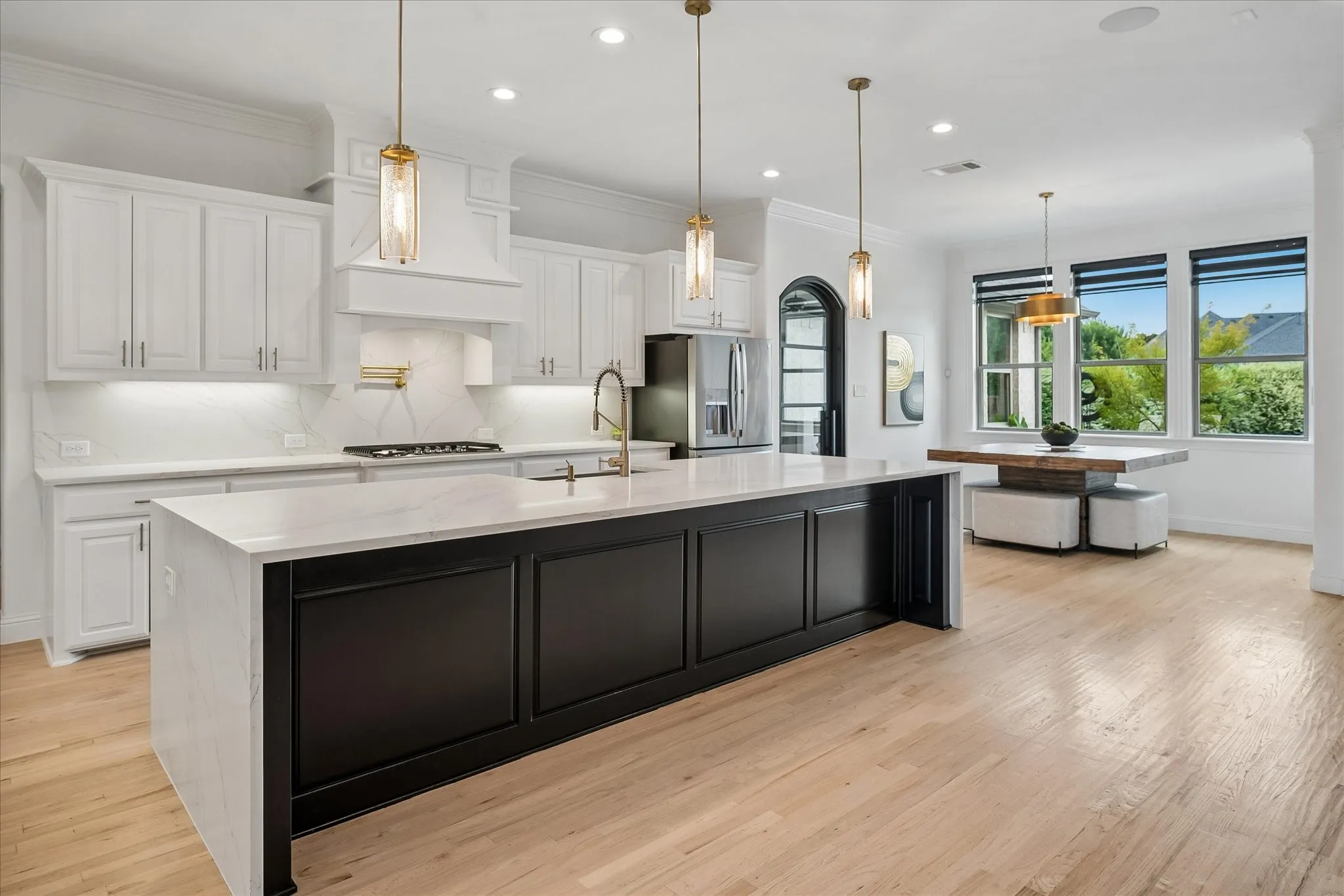Huge Island with Waterfall Countertops