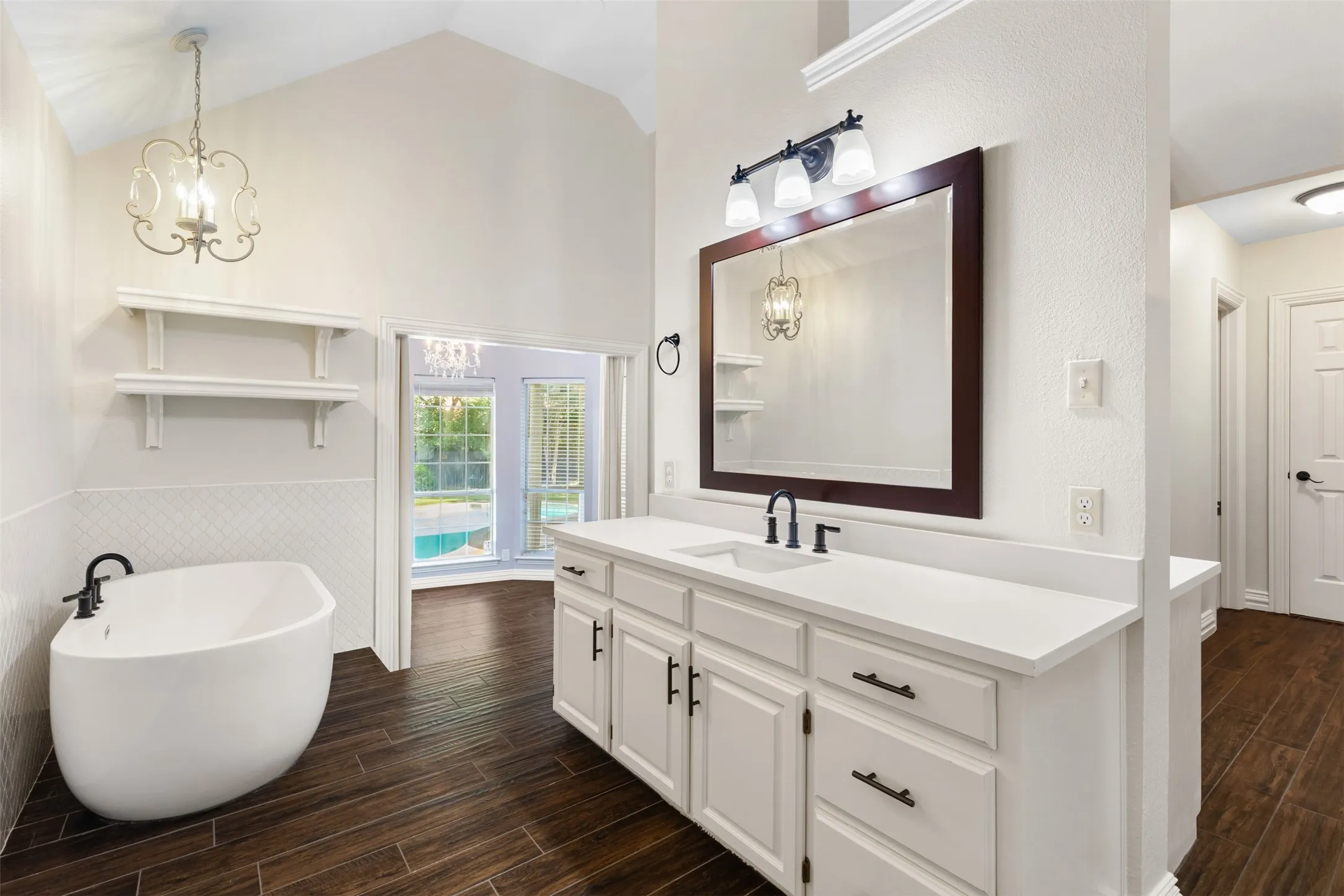 Soaking tub, separate vanities, 2 walk-in closets, tons of storage.
