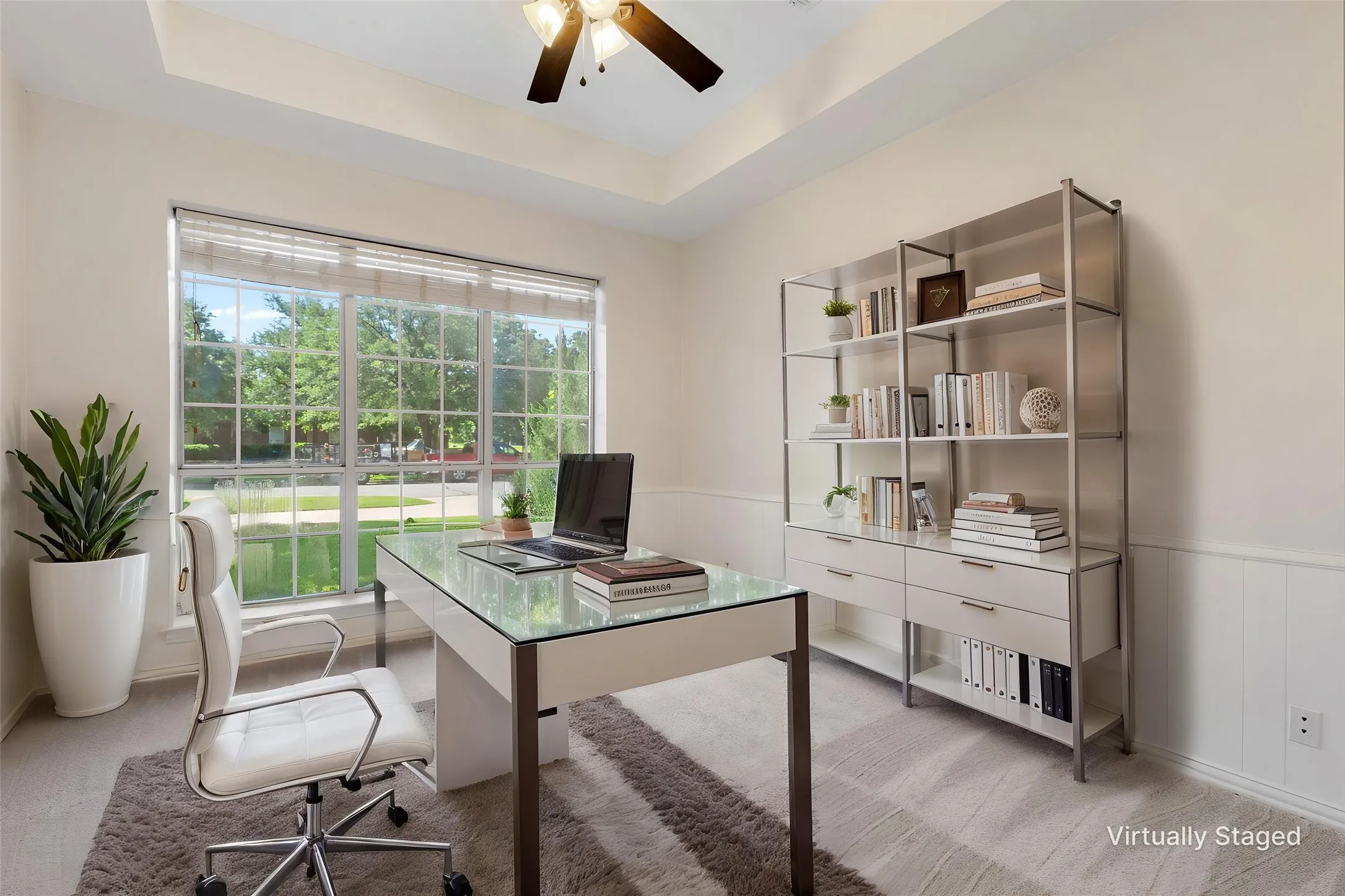 Bedroom downstairs, off entry & living.  Virtually staged as Home Office.