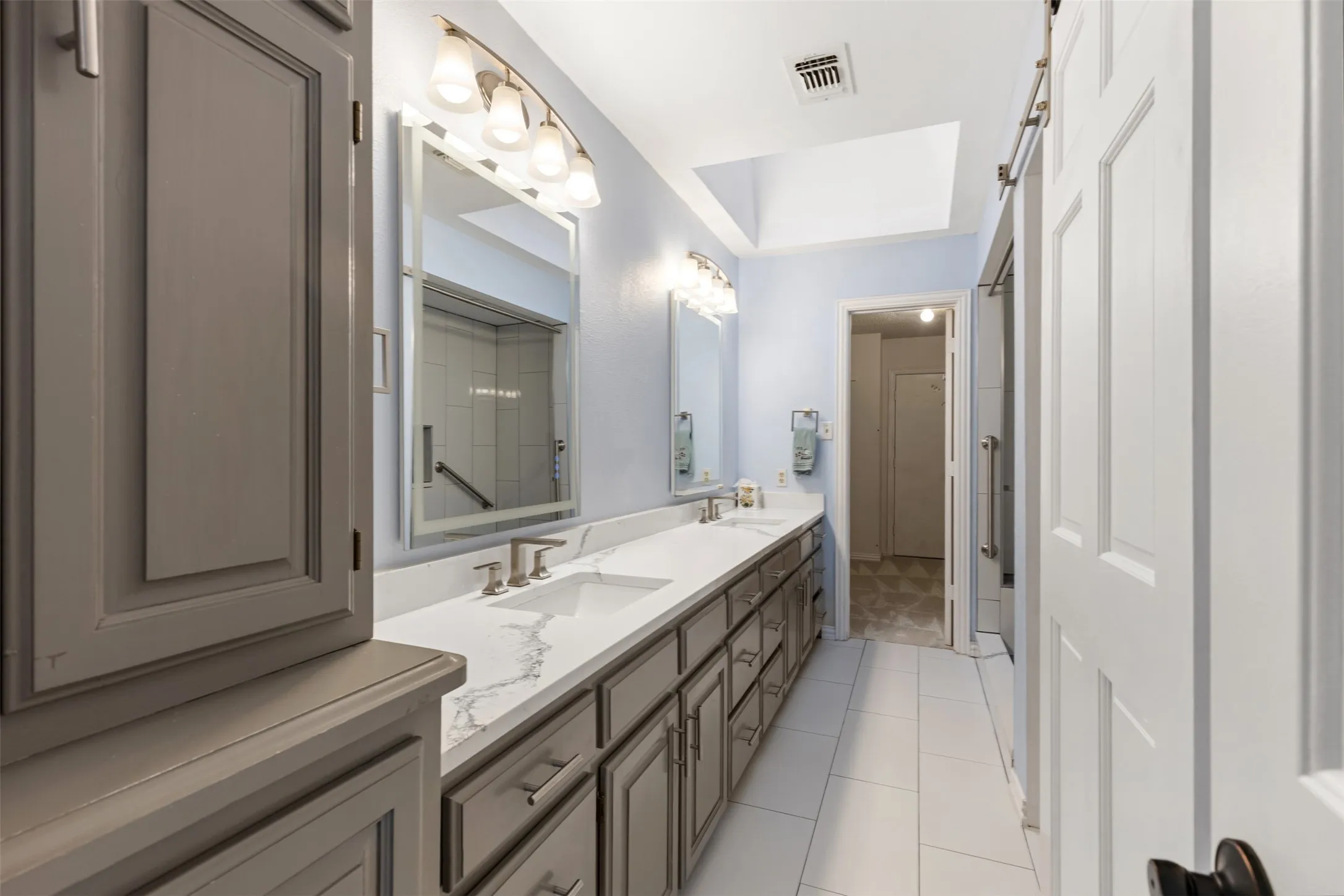 2nd Primary upstairs en-suite bath, remodeled shower with bench and safety rails.