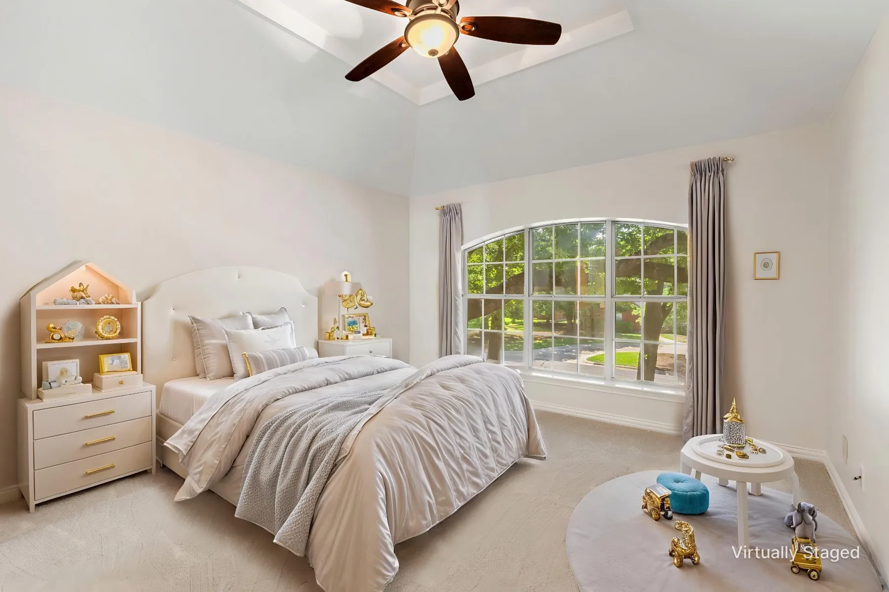Bedroom Upstairs front view with carpet & ceiling fan and Jack & Jill bath access.  Virtually Staged.