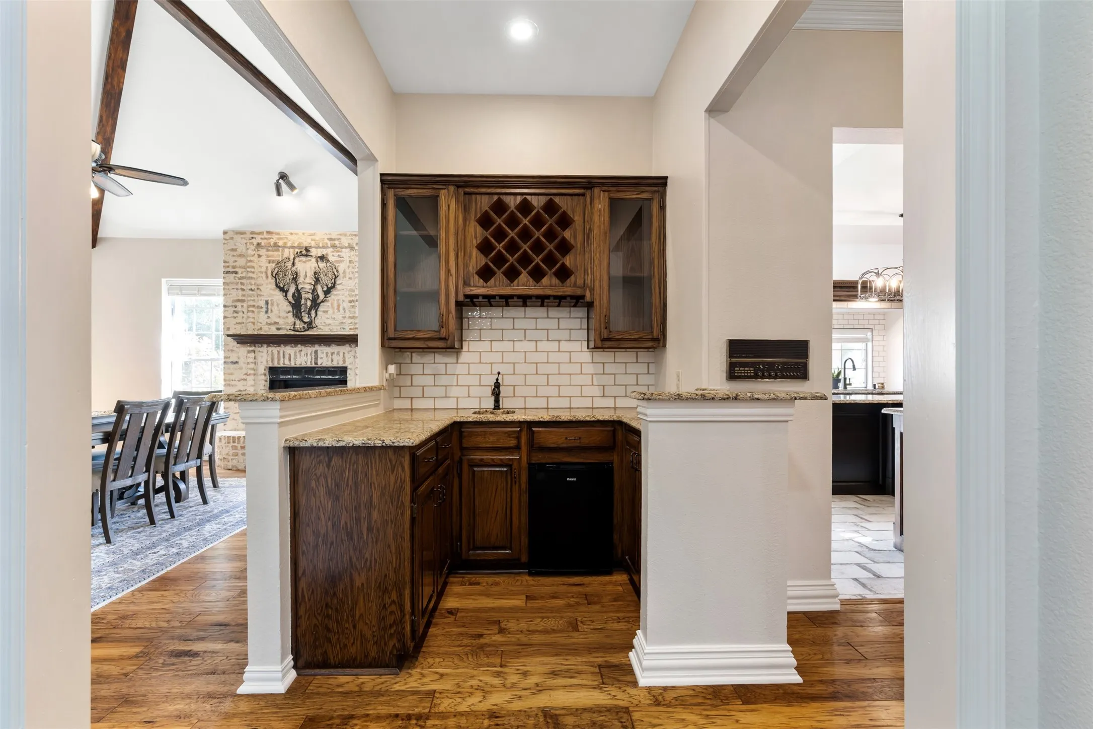 Wet bar with mini-fridge and lots of storage.