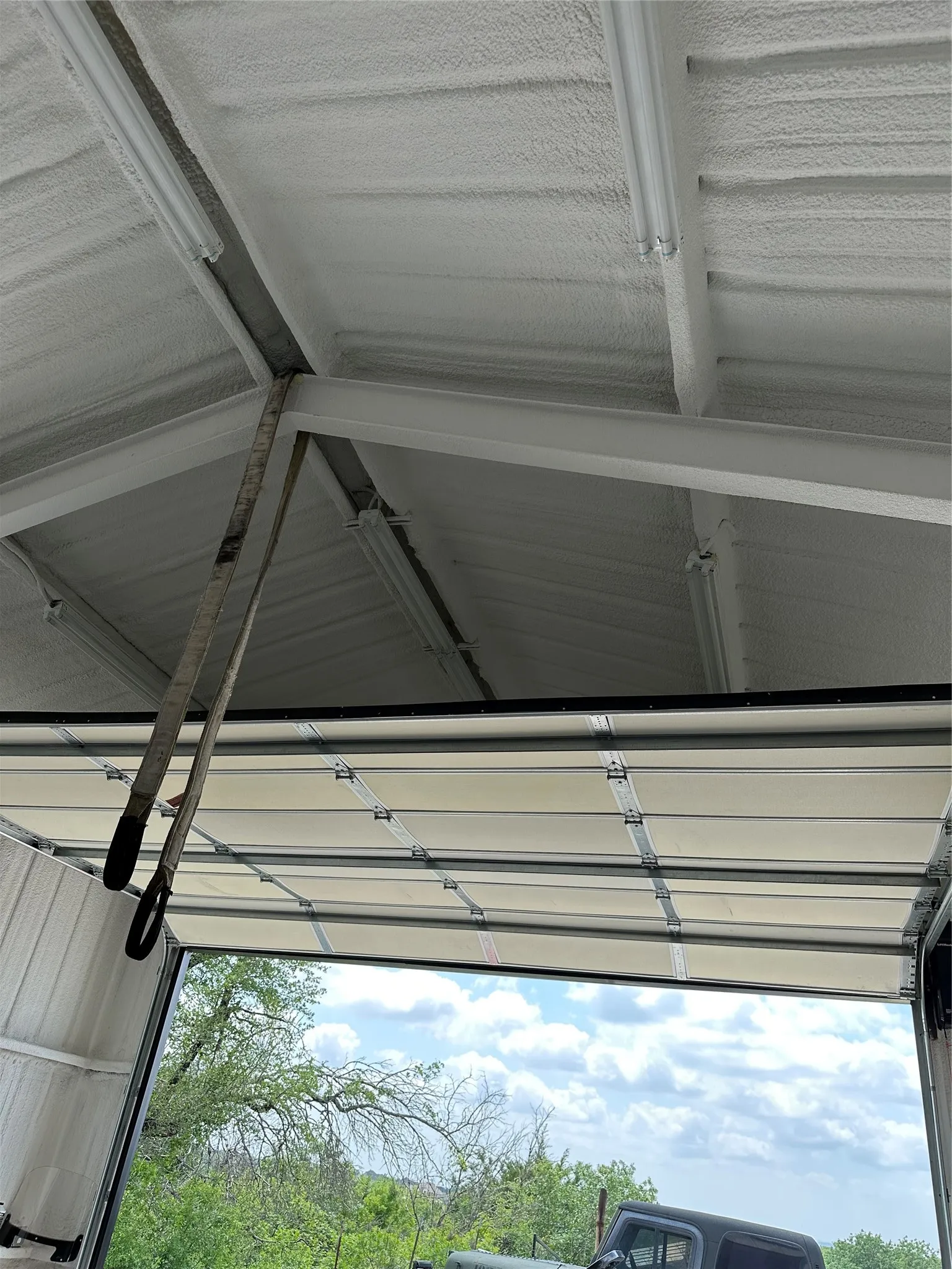 “Energy-efficient foam insulation keeps this workshop comfortable and functional, with electric everywhere you need it.”