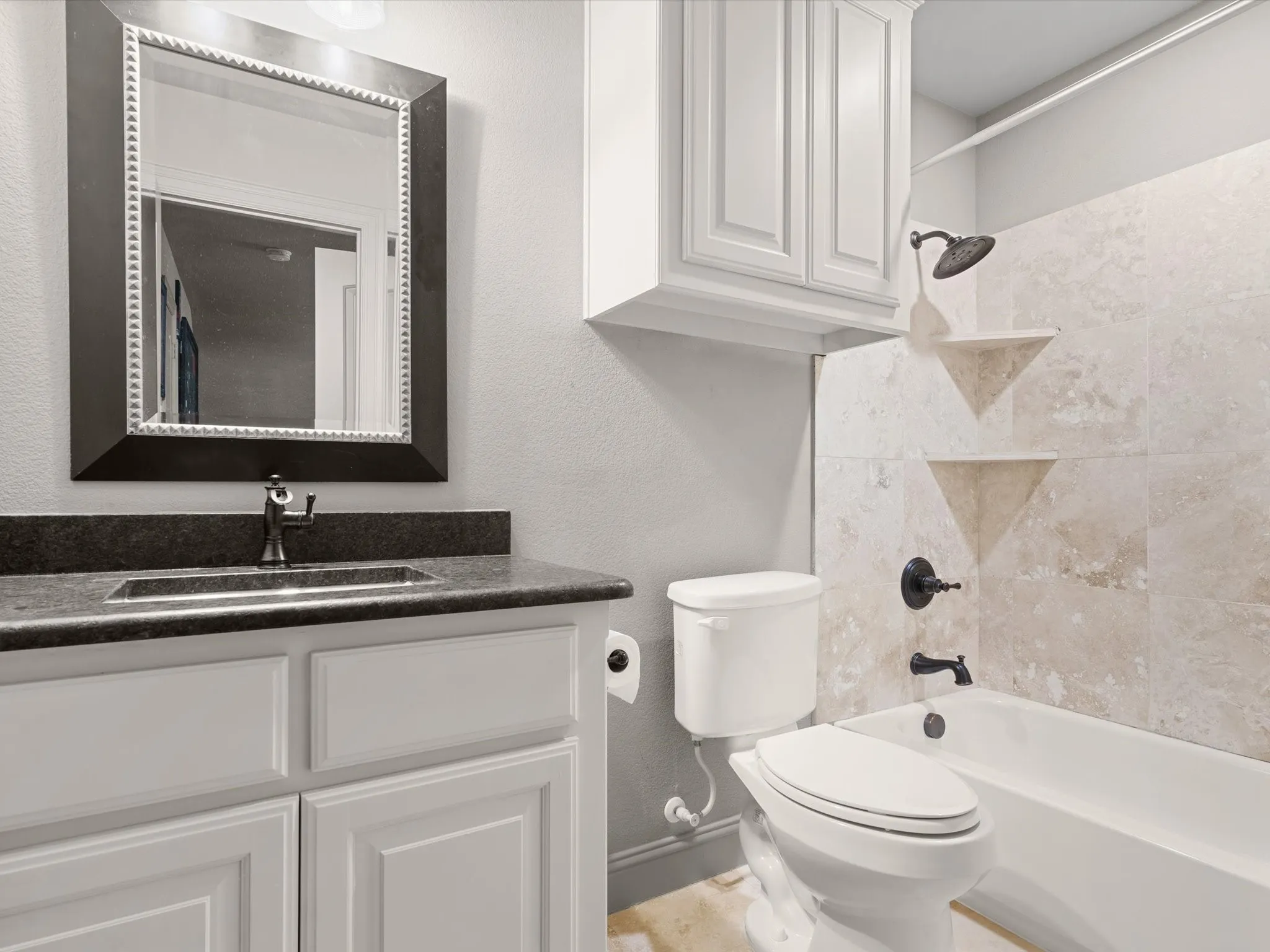 Full guest bath with functional layout and updated hardware.