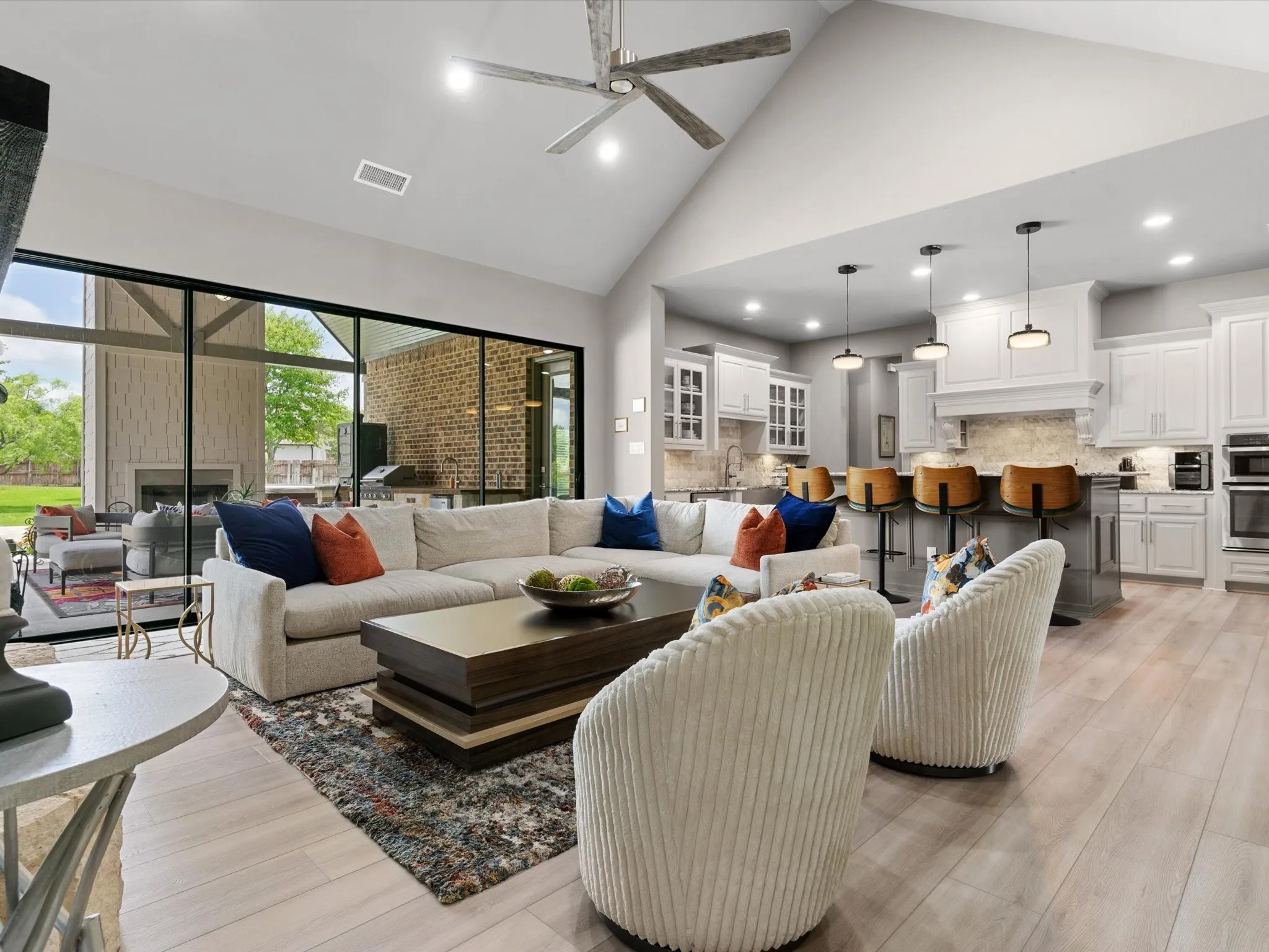 Welcoming entry with updated lighting, fresh paint, and views into the open-concept living spaces.