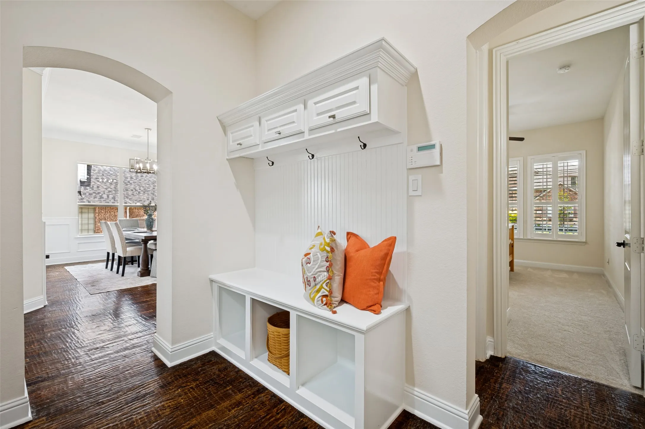 Mud room for holding jackets and backpacks.
