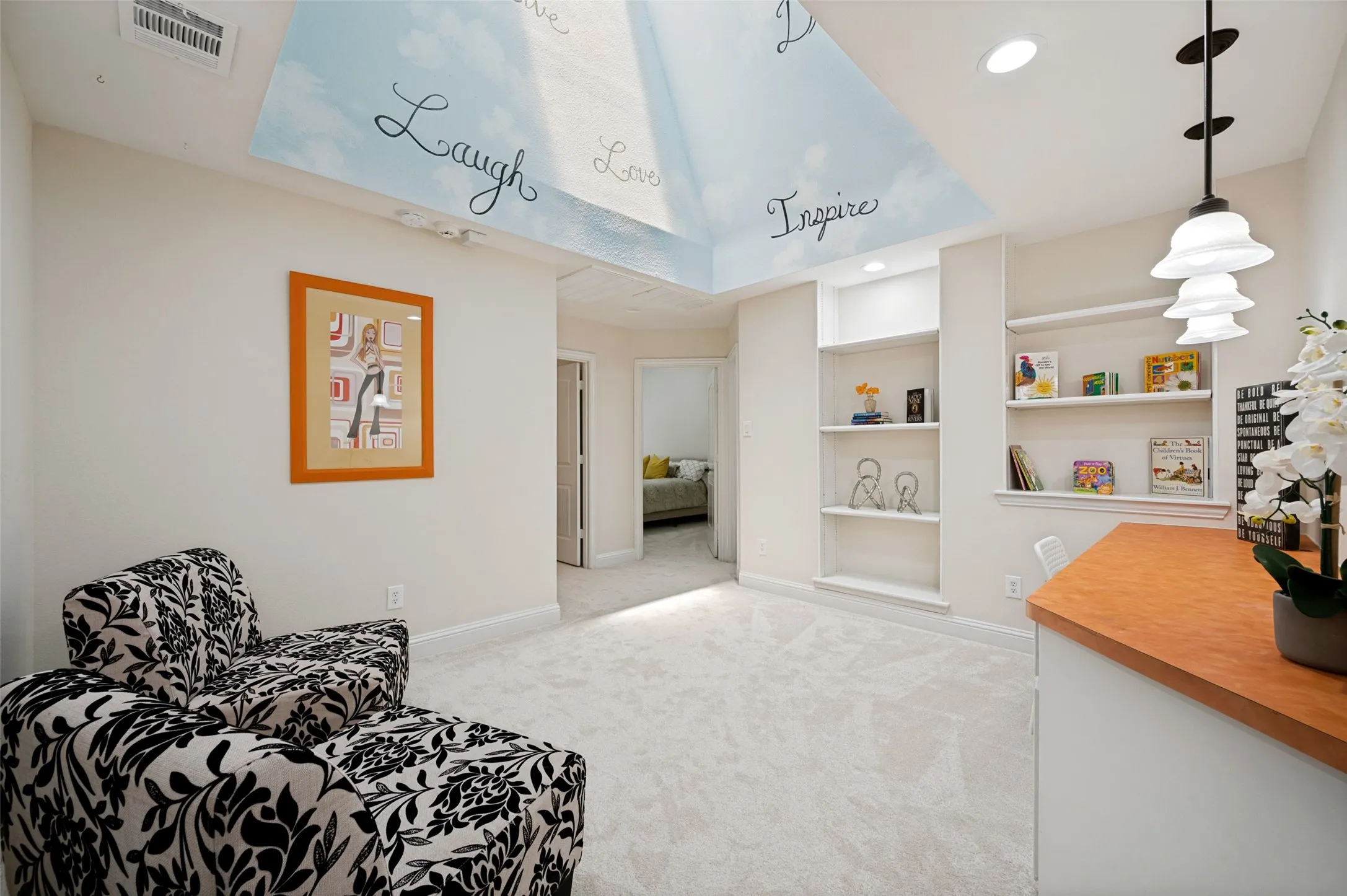 One of three living areas surrounded by two bedrooms.  A perfect place to study or read. Would also make a great teen retreat.