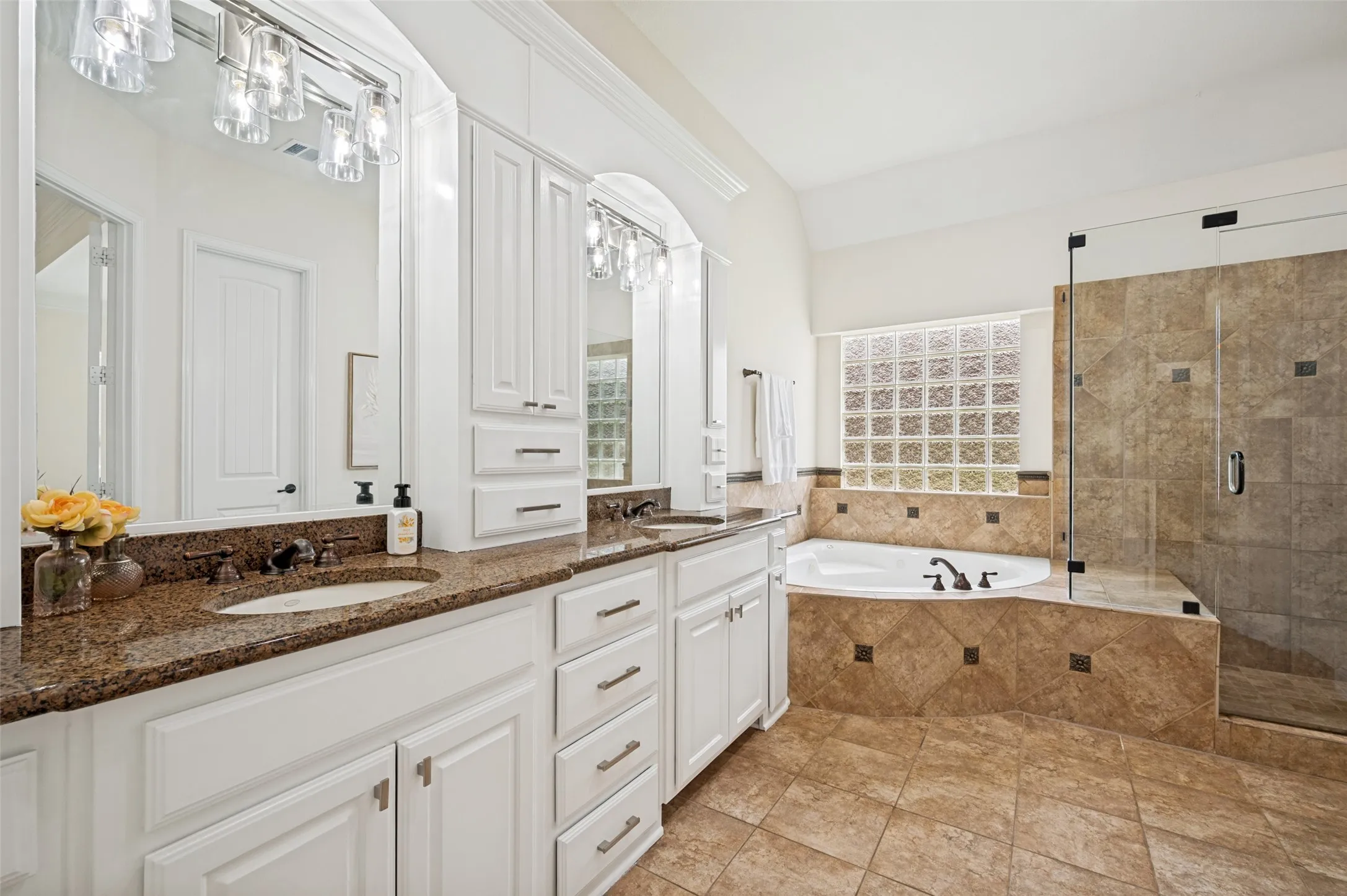 Relax after a long day in the jetted tub with a separate shower.