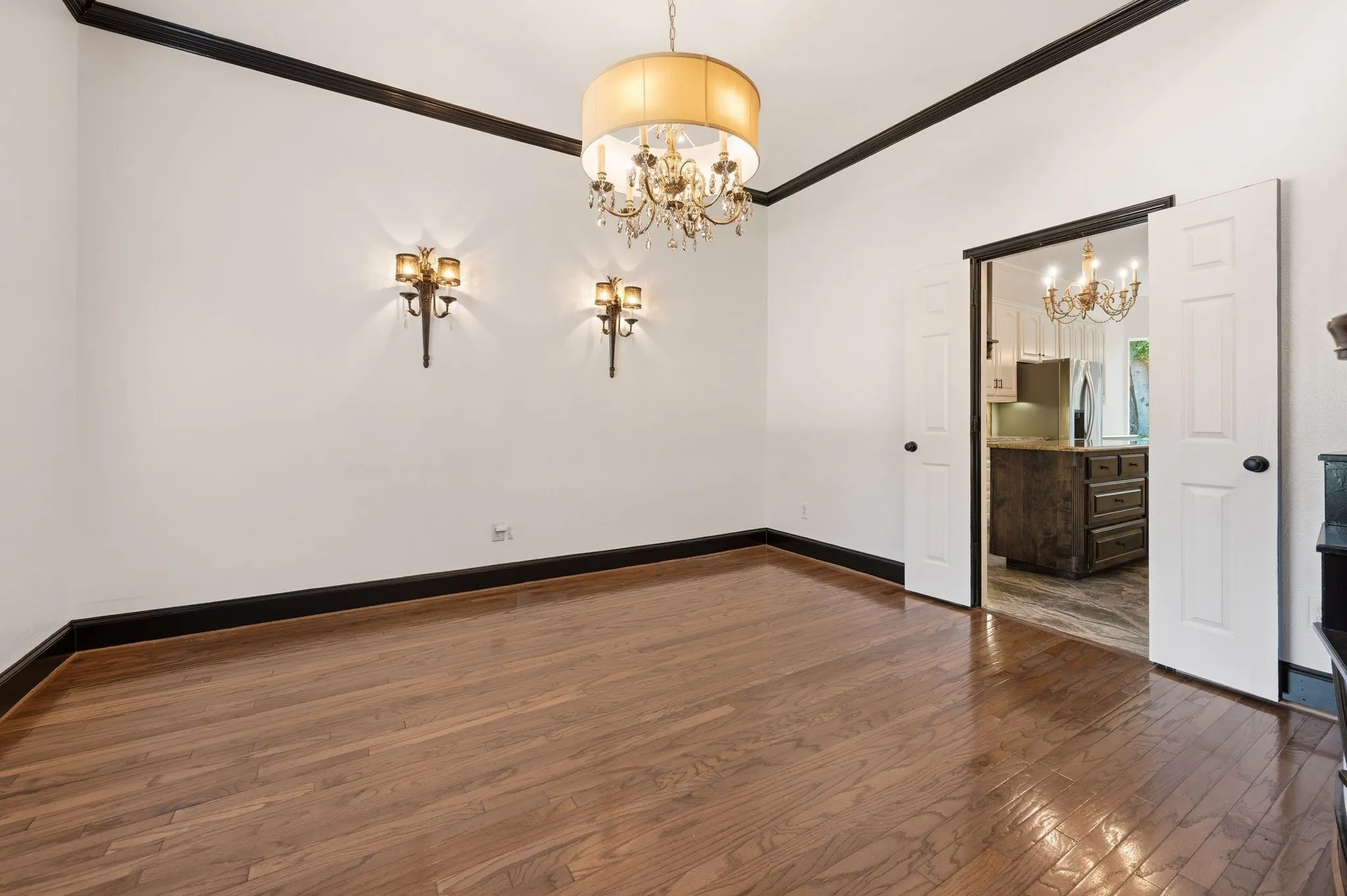 Formal Dining Room with a Chandelier.