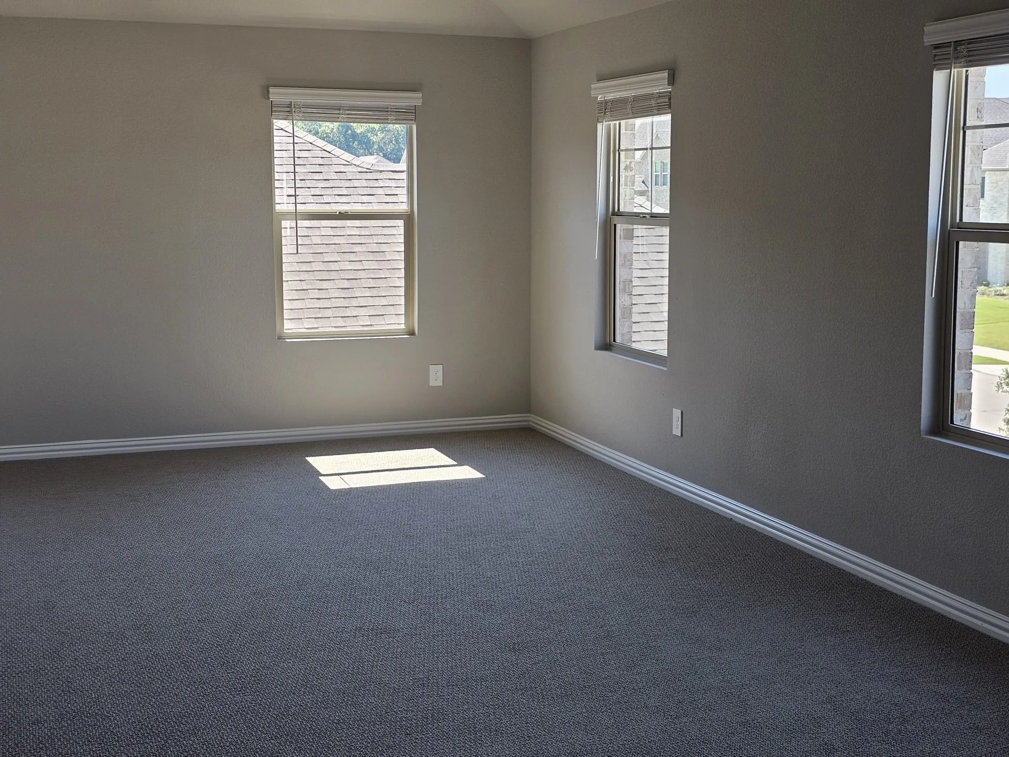 Empty room with carpet floors