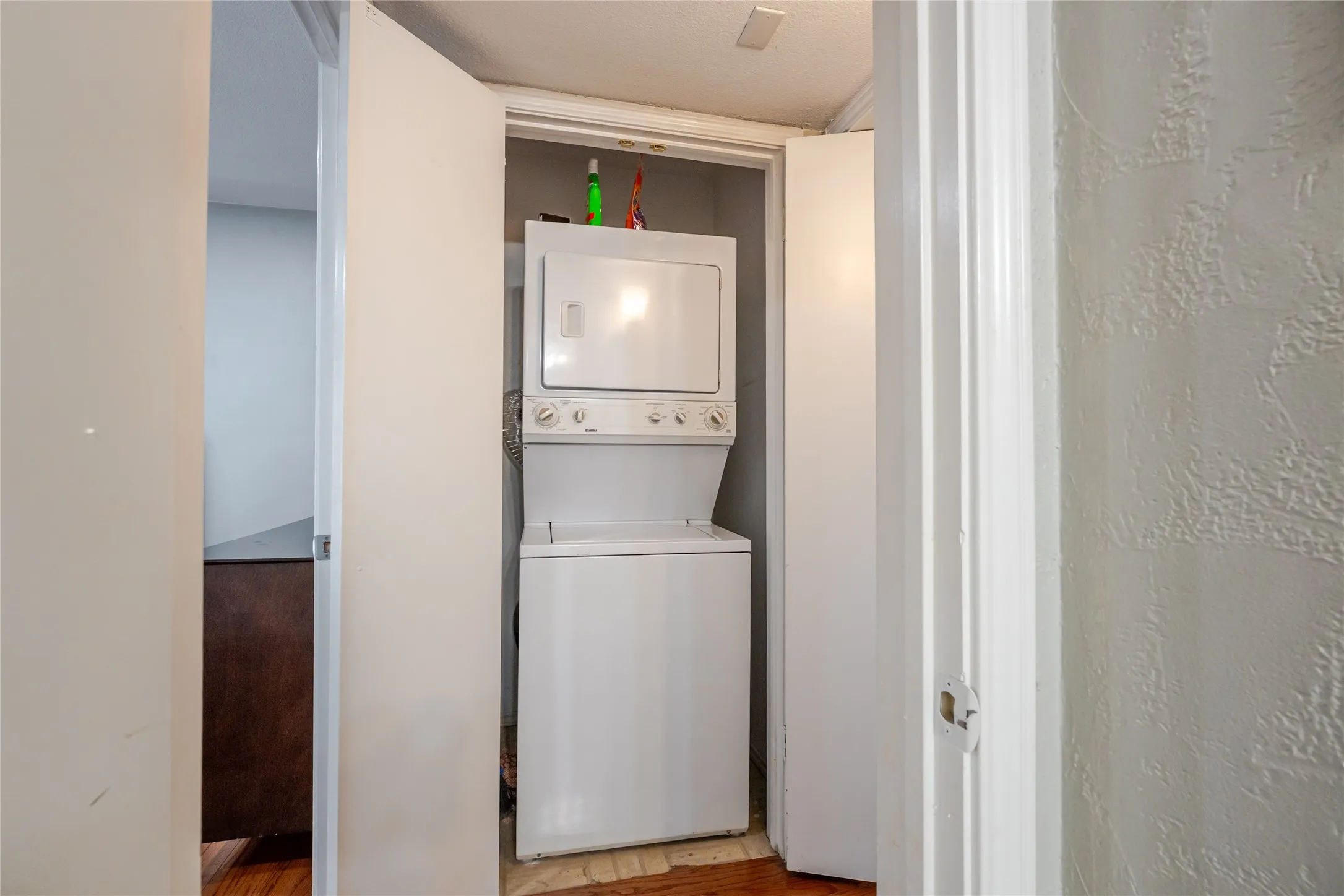 White stacked washer and dryer unit