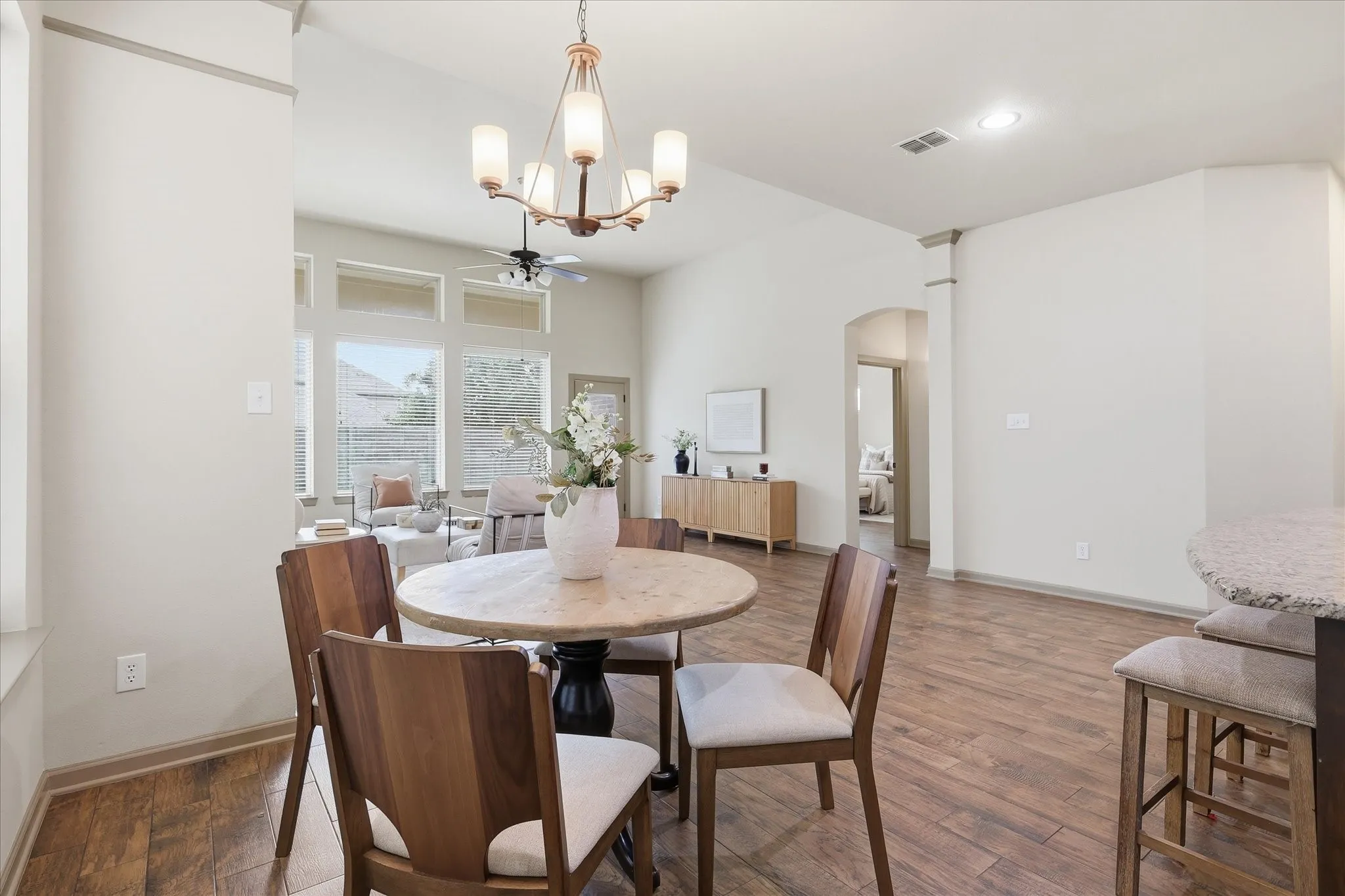 This breakfast area is just off the kitchen and open to the living room.
