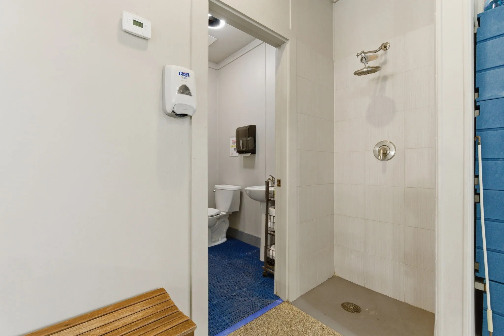 pool area full bathroom with shower