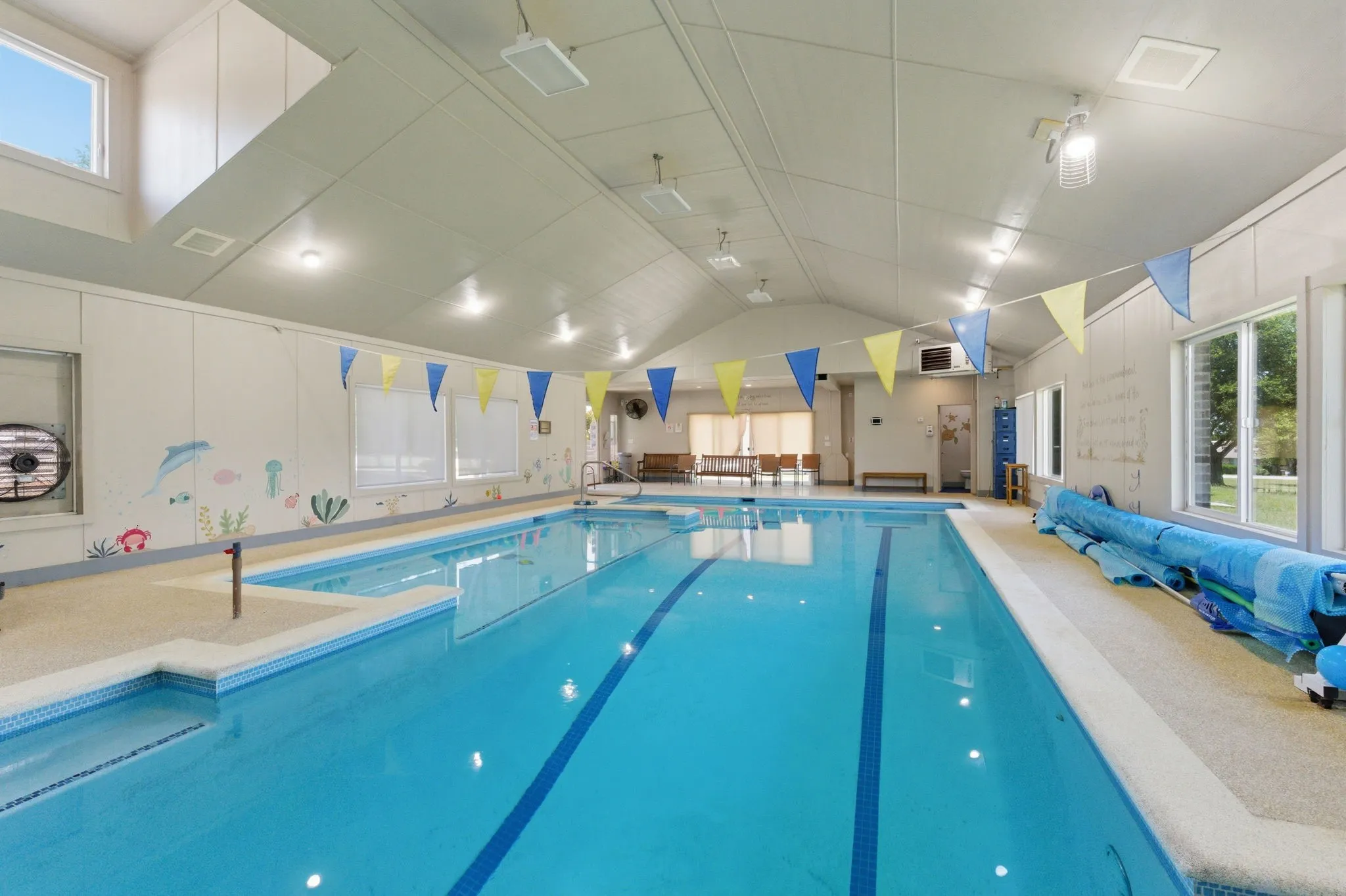 full size indoor pool used for swimming pool business