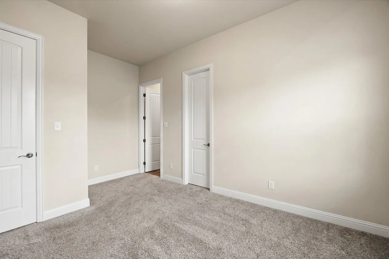 1 of 3 secondary bedrooms.