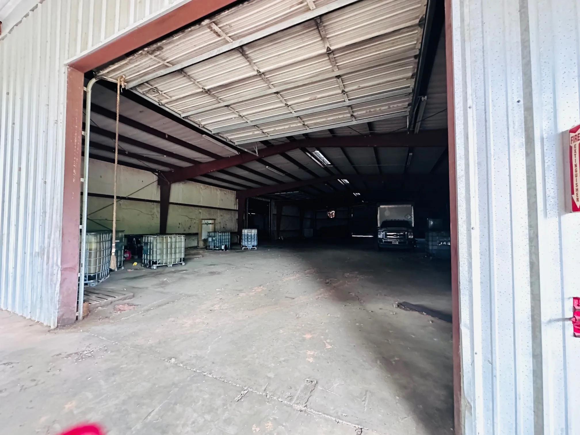 Expansive warehouse space featuring roll up dock doors