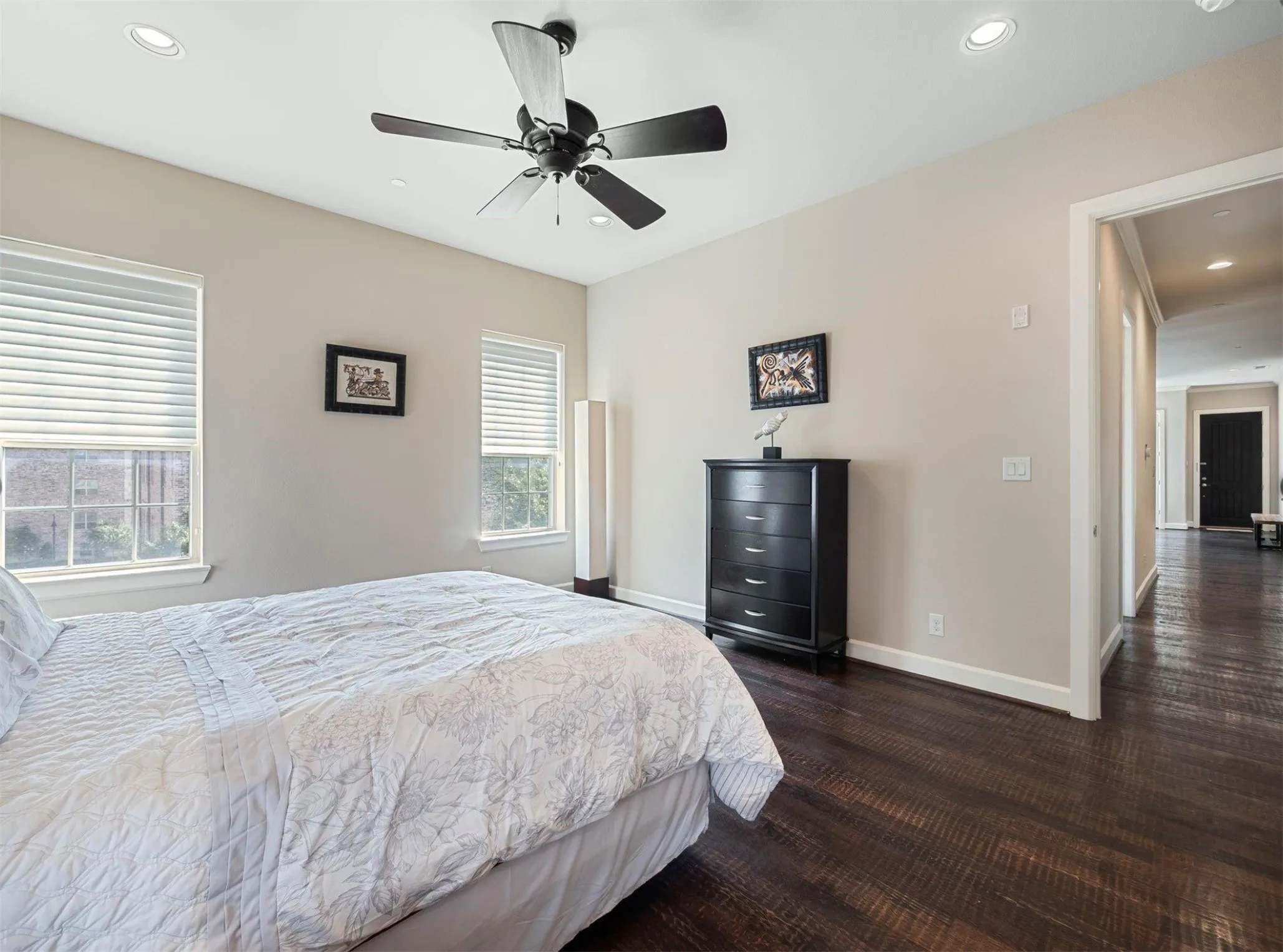 Room featuring recessed lighting, a ceiling fan, and wood-finish flooring
