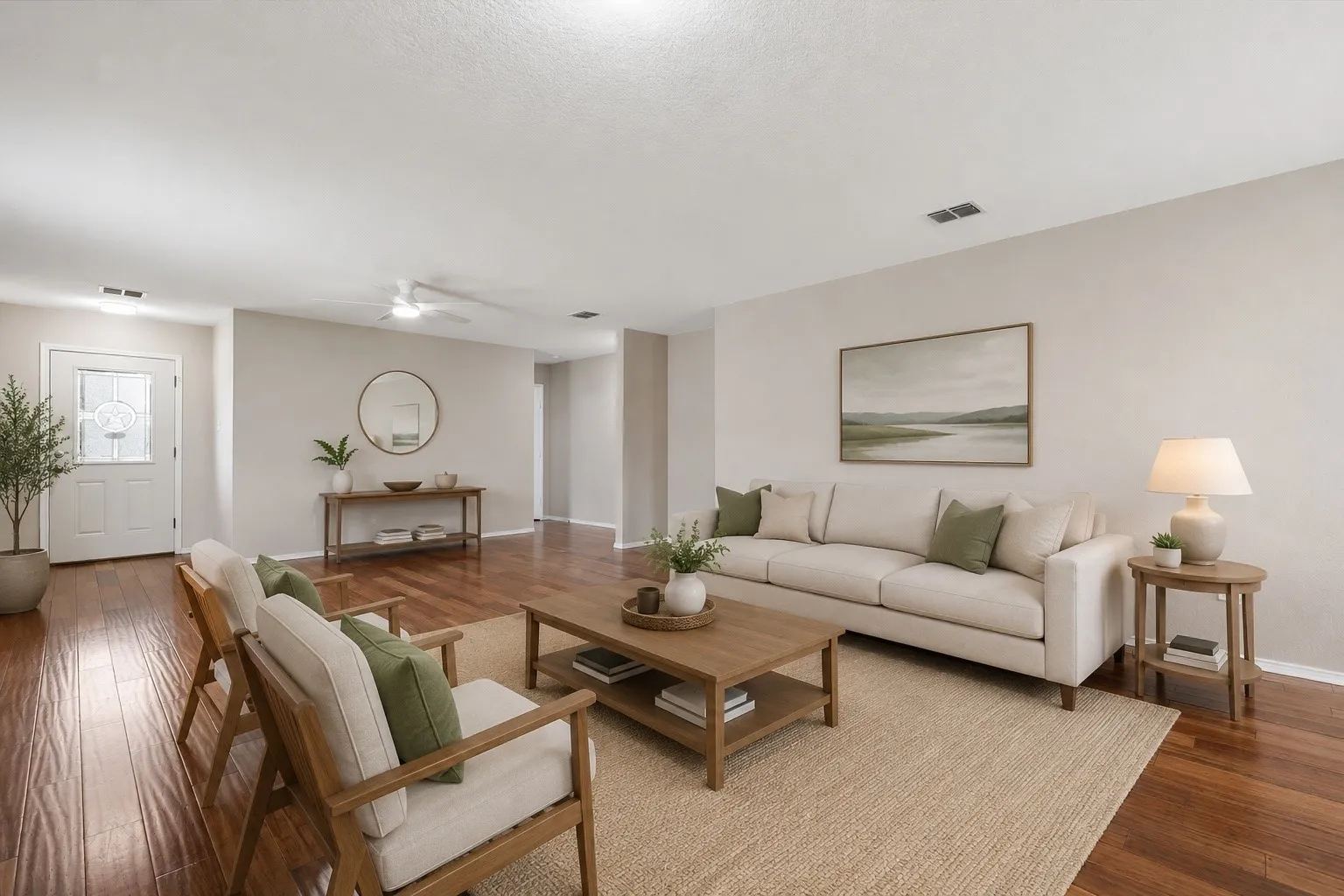 Spacious living area featuring polished wood-finish flooring, a neutral color palette, ceiling fan, and recessed lighting