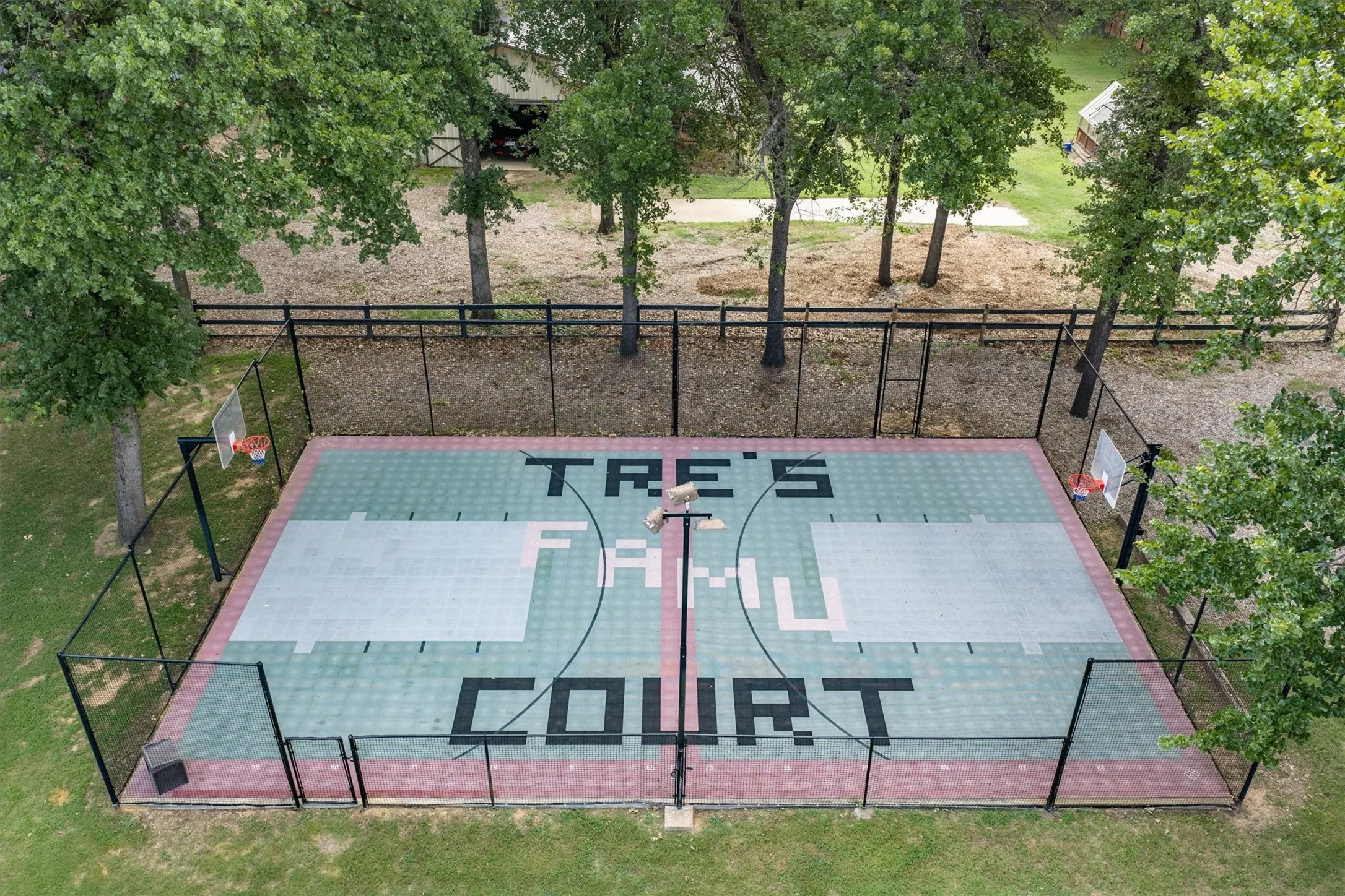Sport court installed by first owner, Dallas Cowboy Nate Newton