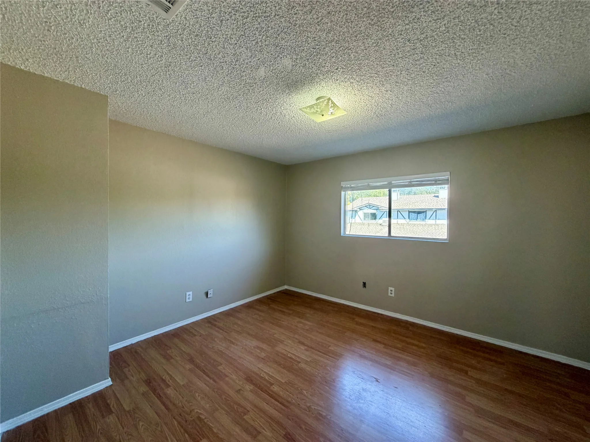 Wood-finish flooring with a neutral wall palette