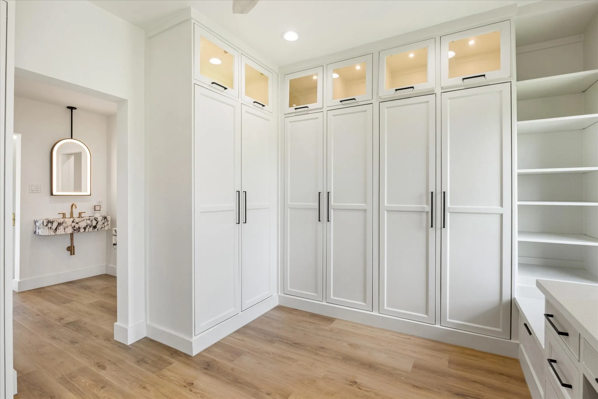 Custom Closet with Floor-To-Ceiling Storage Throughout