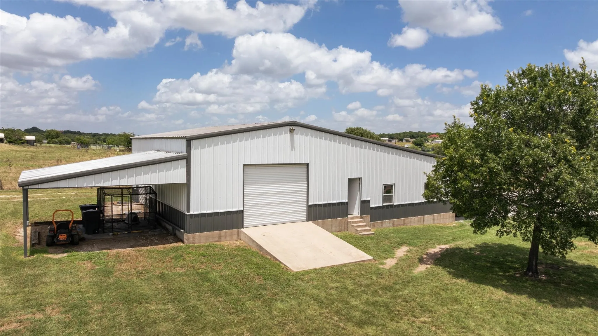 2,400 sf Workshop With Covered Parking, Tractor Parking, and 2 Roll Up Doors