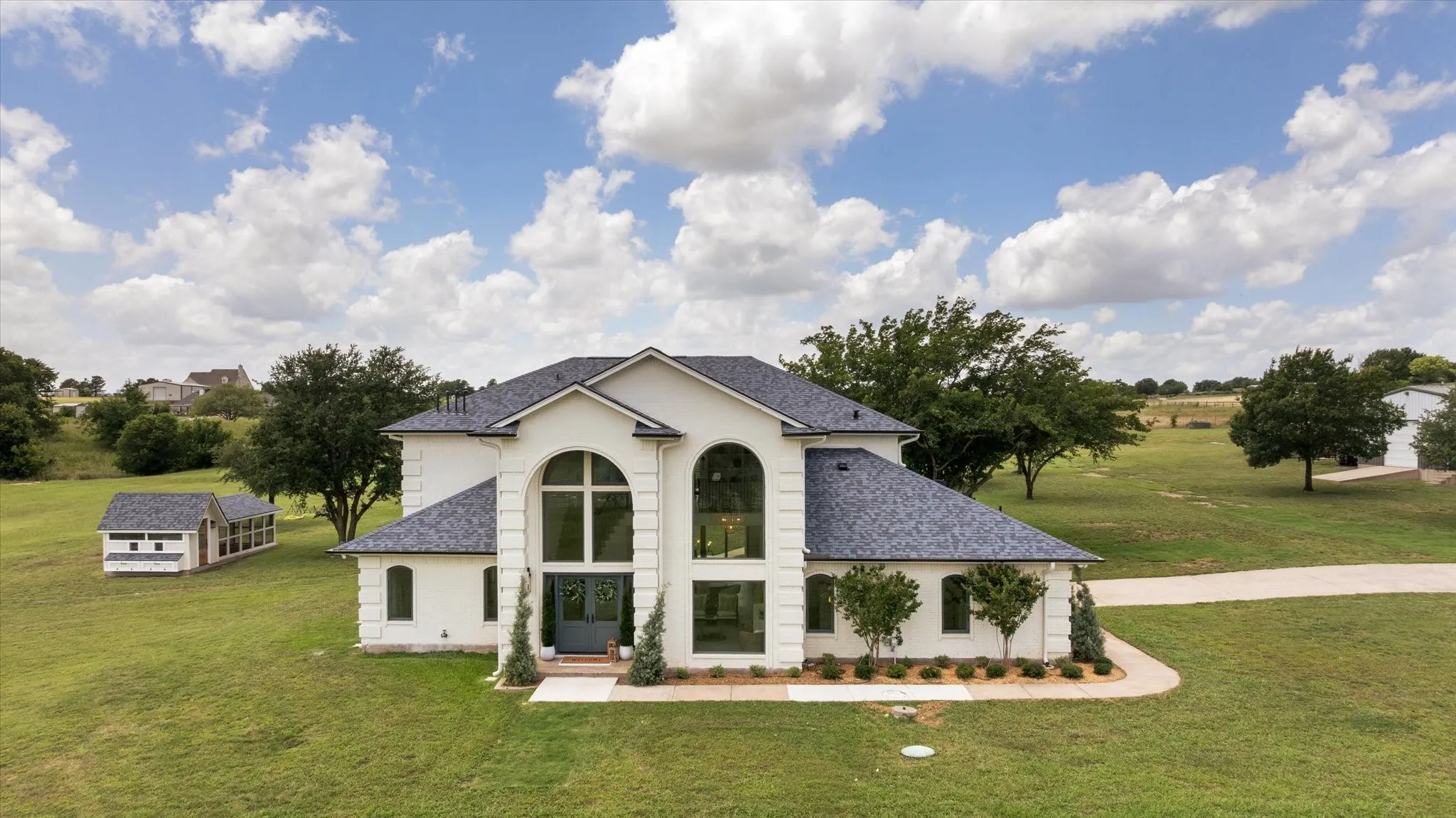 Brand New Pella Windows and Doors. New Roof. New Gutters. New Exterior Paint. New Landscaping and Sidewalks.
