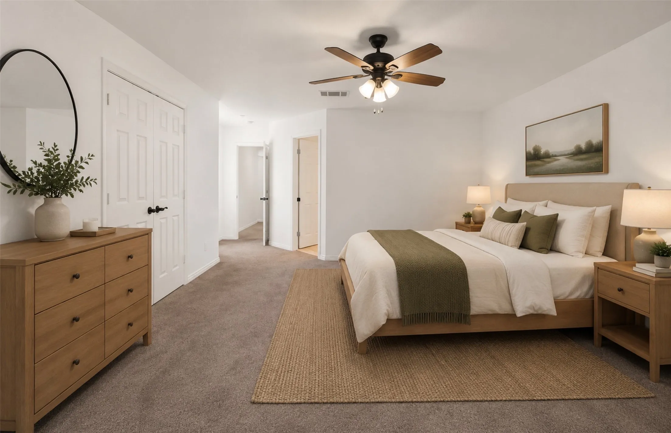 Plush carpeting throughout with a ceiling fan light fixture