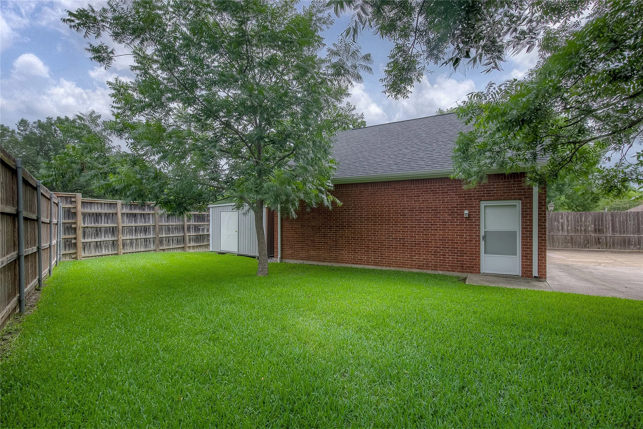 Detached garage with extra storage building at rear
