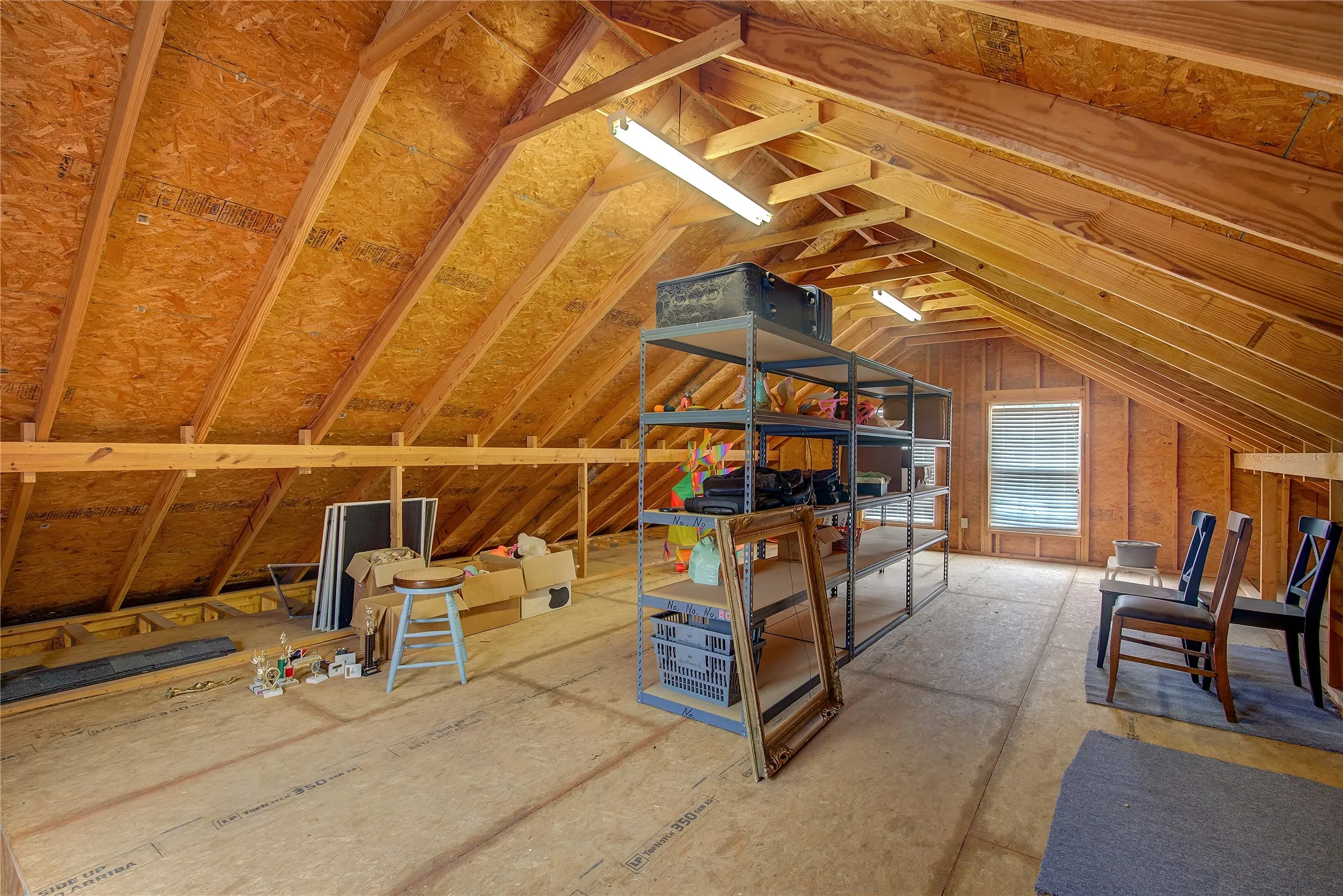 Upstairs detached garage storage loft