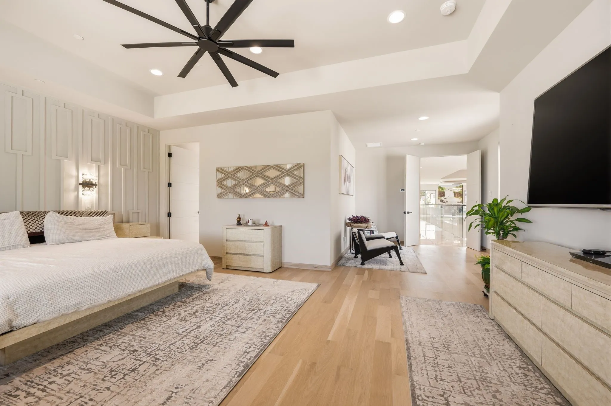 Private bedroom suite with double door entrance.