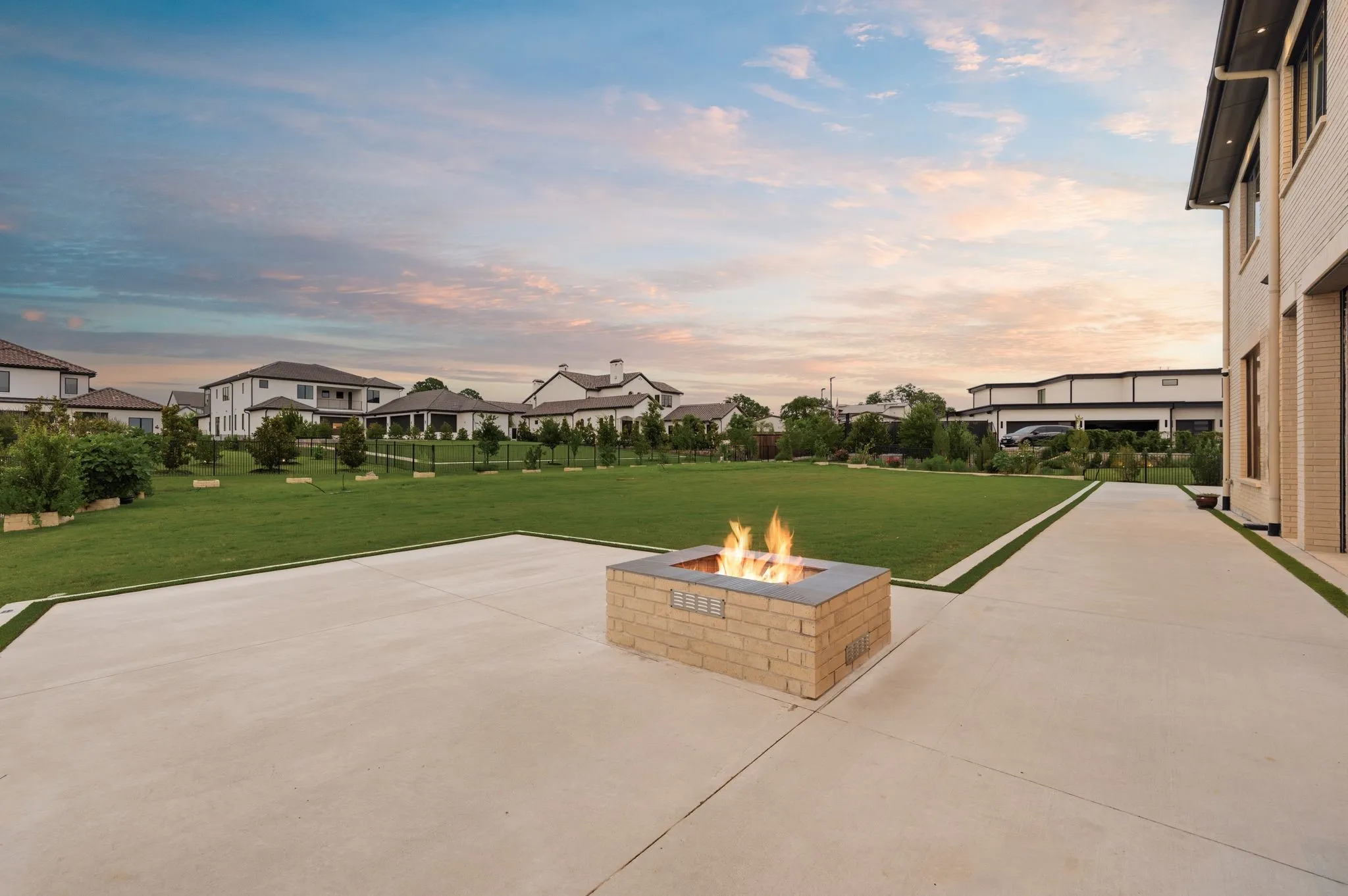 Resort style backyard featuring expansive entertaining and lounge areas.