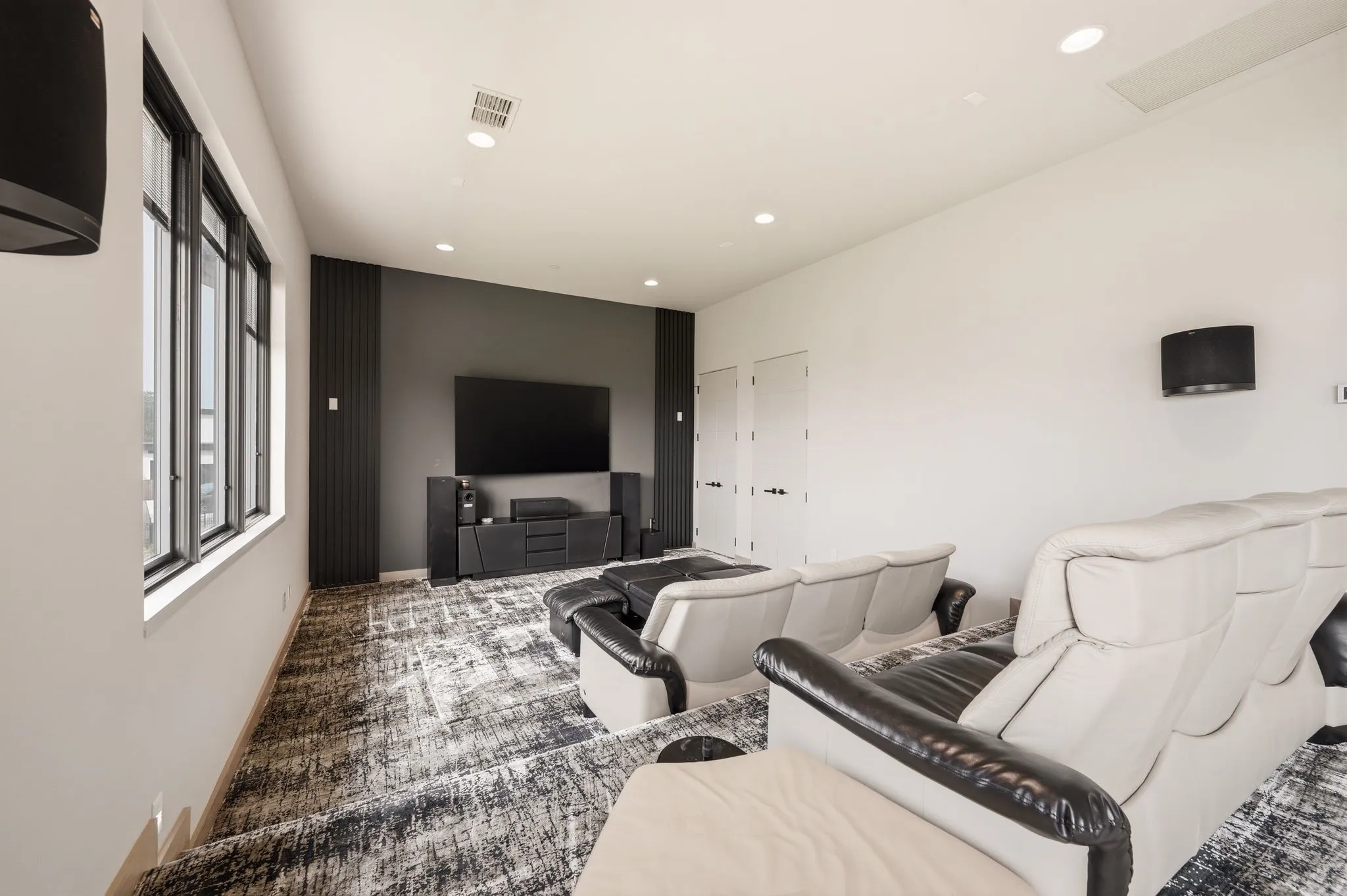 Private media retreat designed for elevated movie nights and relaxation.