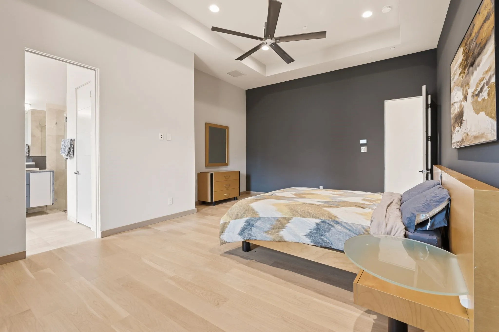 Spacious bedroom offering comfort and contemporary style.