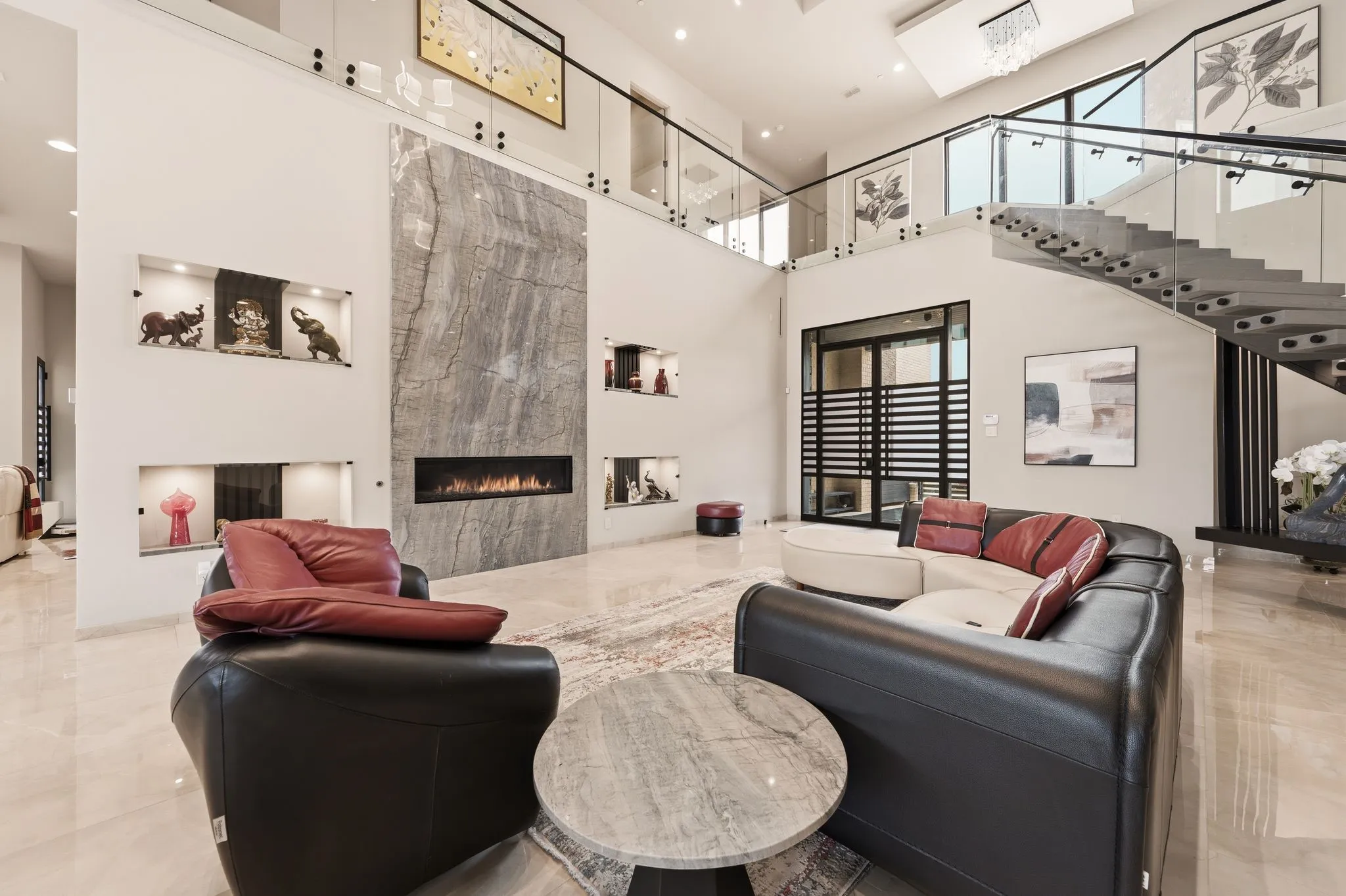 Designer living area with dramatic ceiling detail and effortless flow.