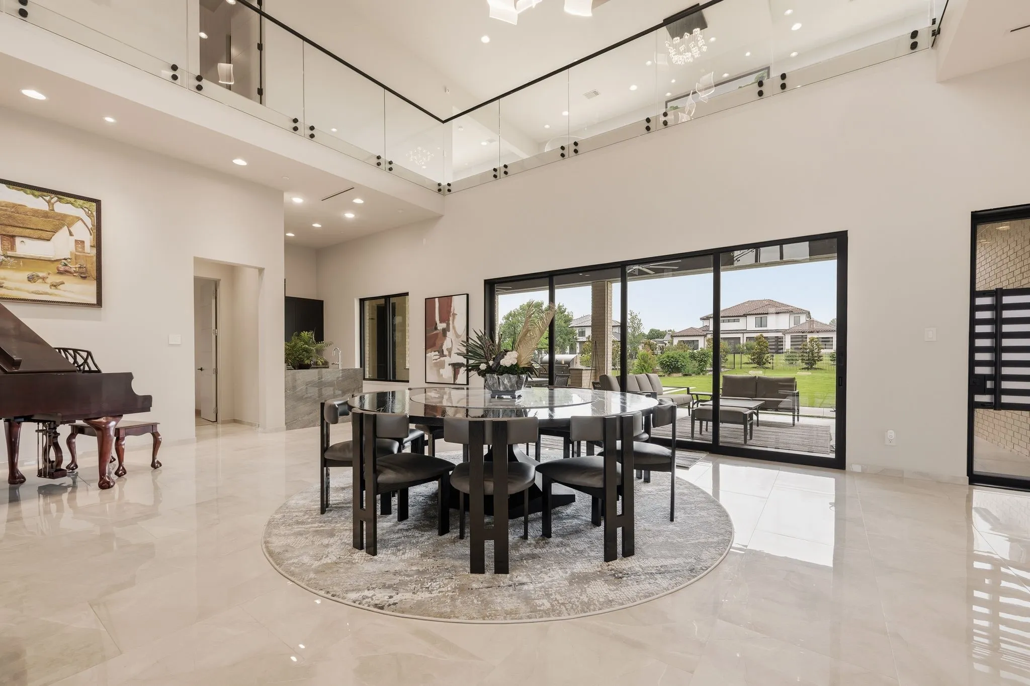 Elegant dining space overlooking the outdoor living areas.