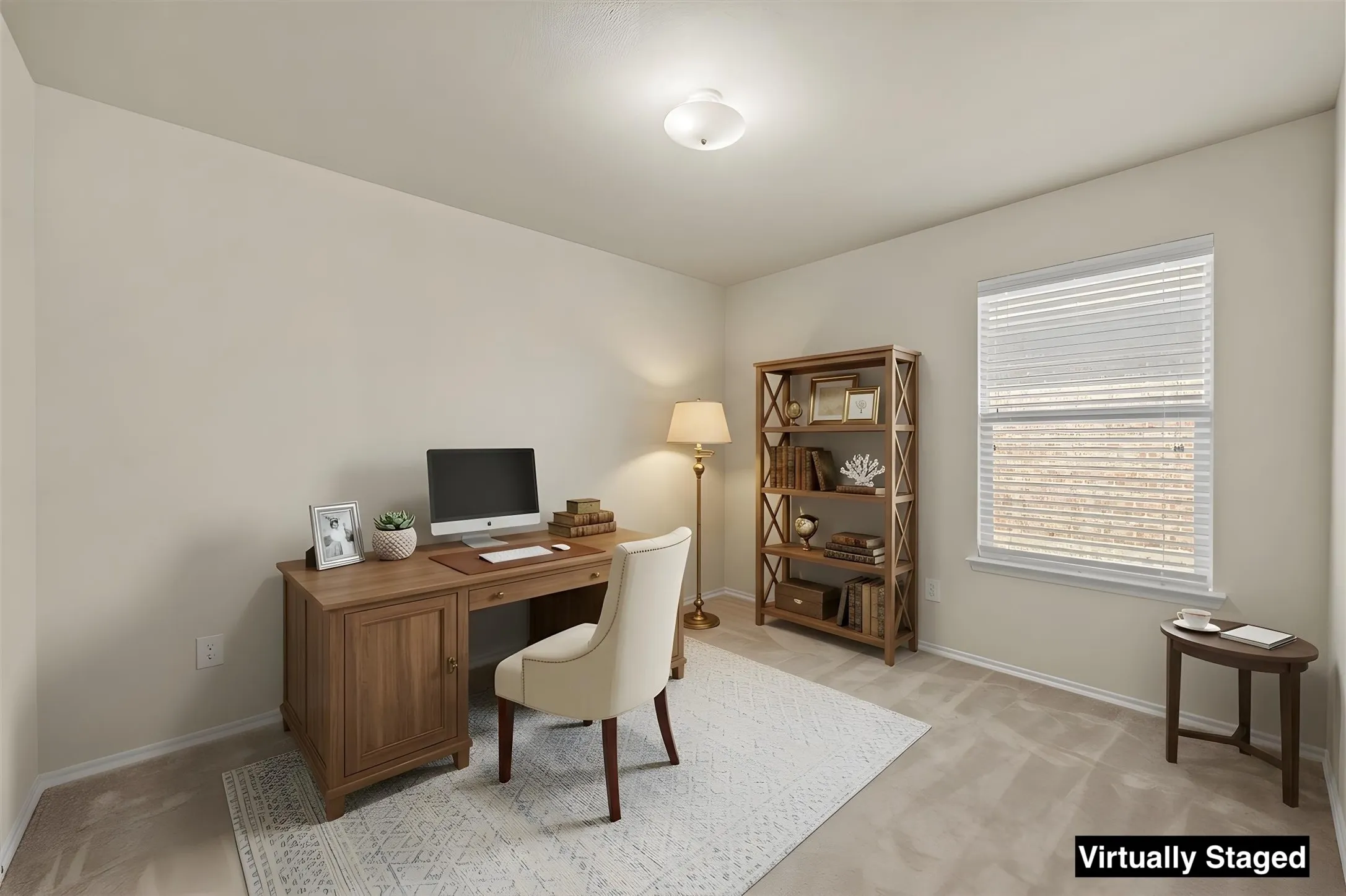 Neutral-toned room featuring light beige walls and carpeting