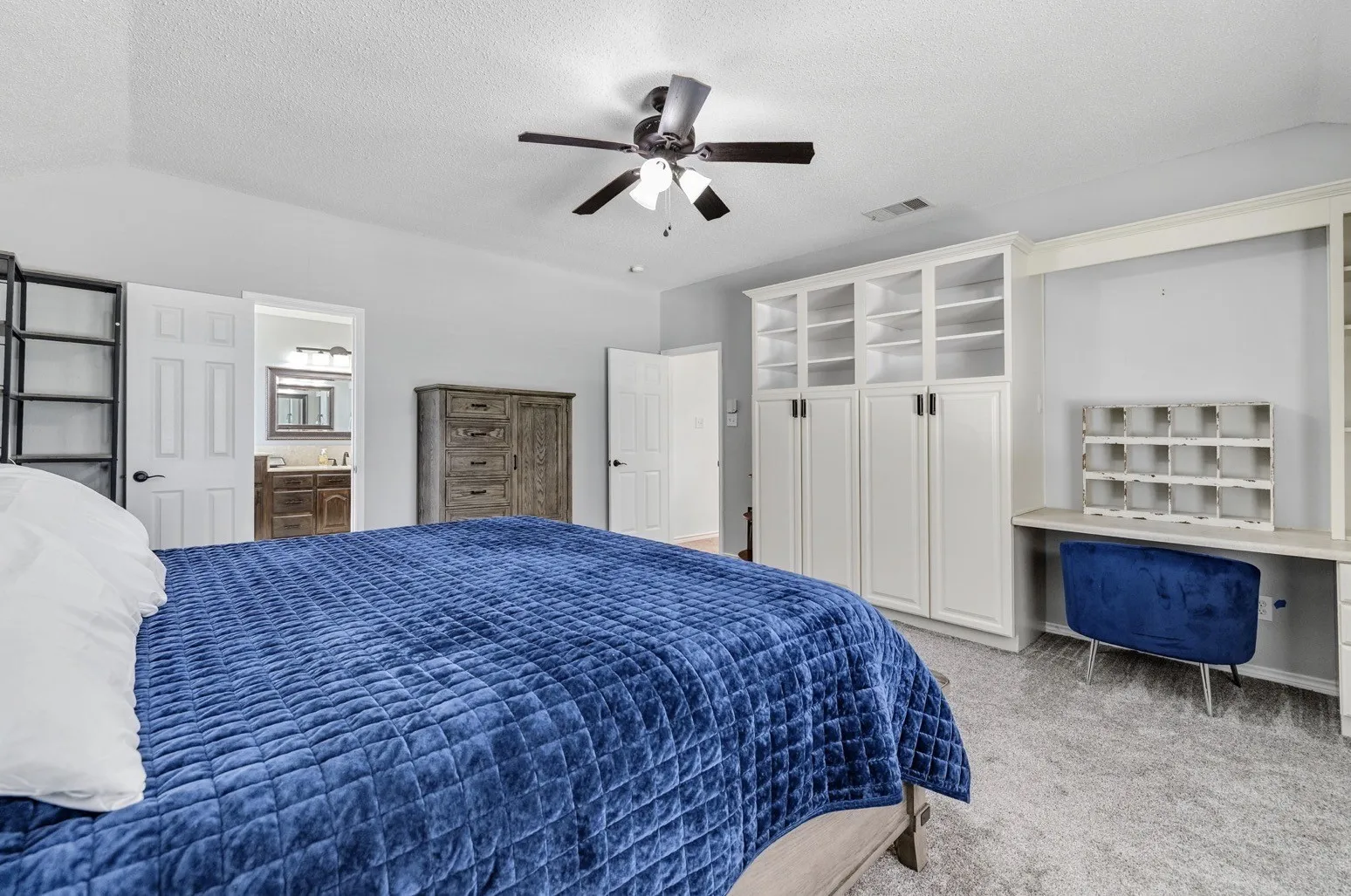 Bedroom featuring a vaulted ceiling and an integrated ceiling fan with lighting