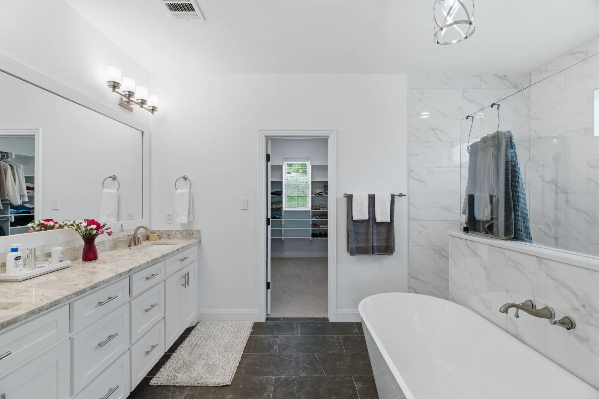 Large bathroom with free standing tub