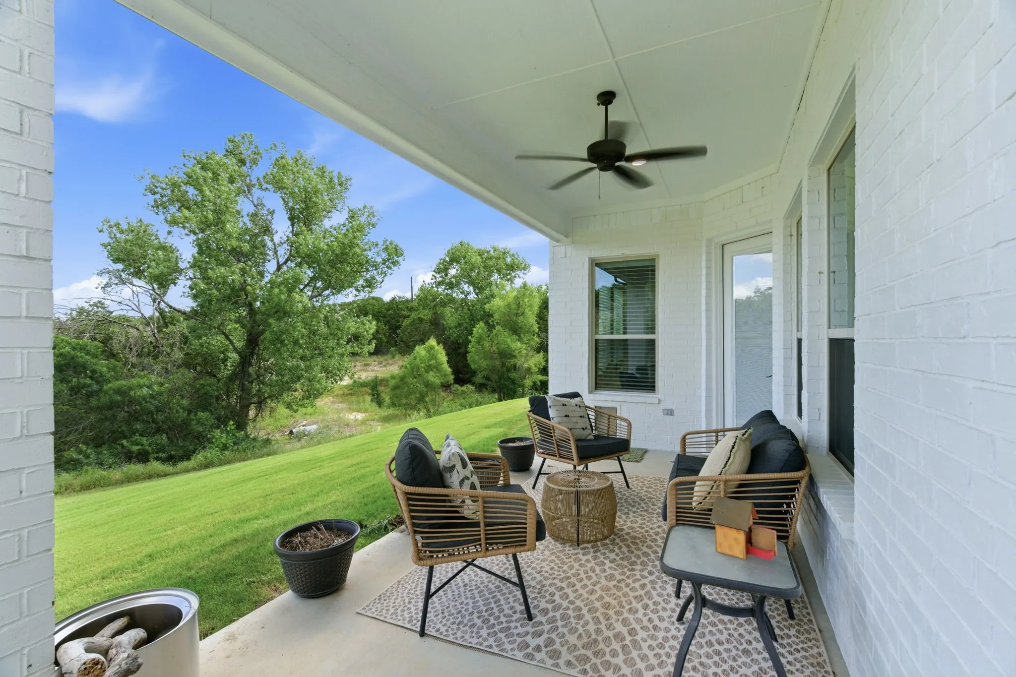 treed lot with fully fenced yard