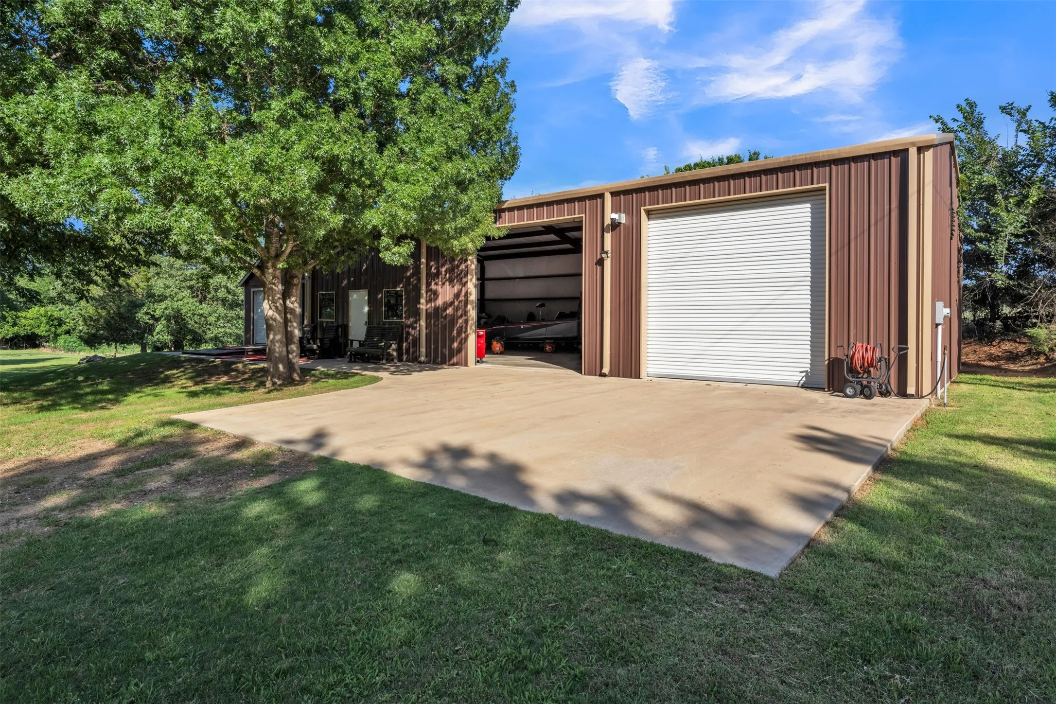 60X30 Metal Shop in back of property on 80X40 concrete pad