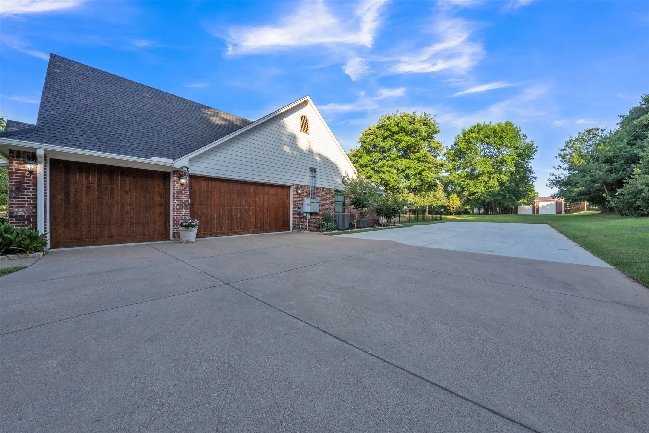 3 car garage with epoxy floor and freight elevator