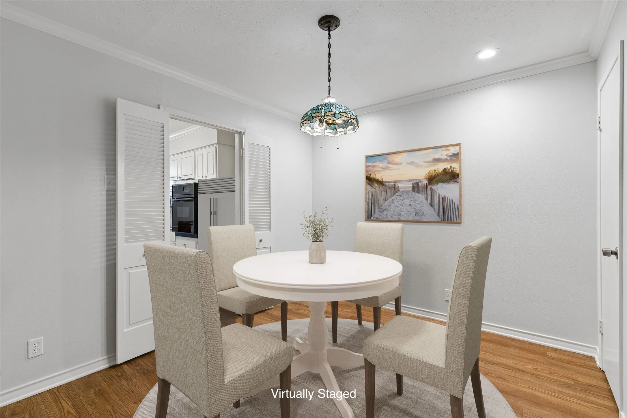 Dining area sits just off the kitchen, perfect for everyday meals or entertaining.