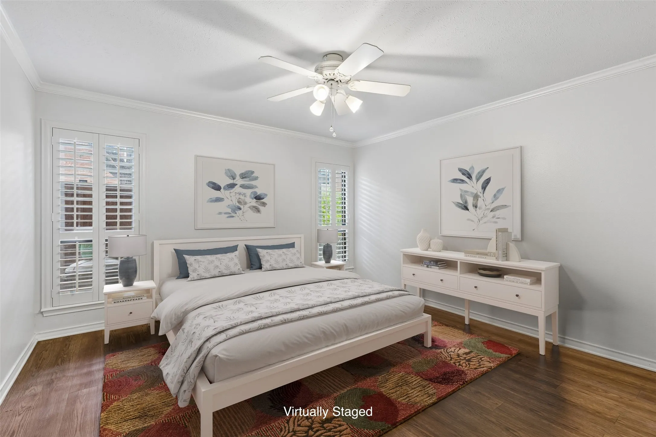 Guest bedroom offers courtyard views, a walk-in closet, and plenty of natural light.