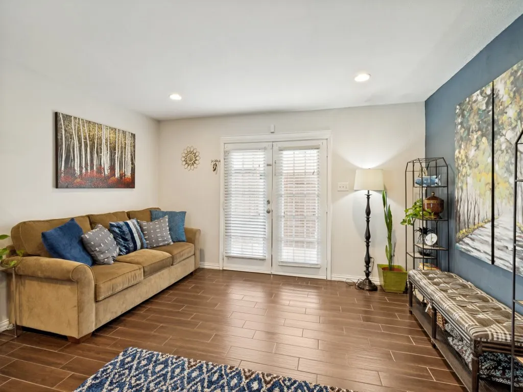 This living room includes a nice little sitting area that's perfect for relaxing with a book or having a chat.
