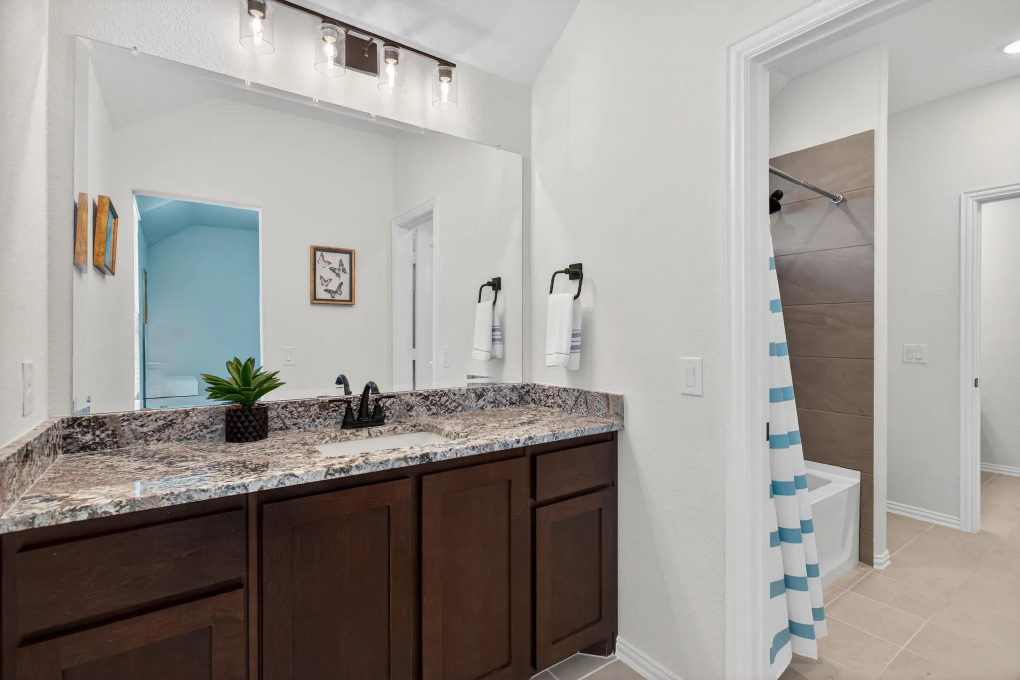 HUGE vanities with lots of storage - and separate toilet and tub spaces.