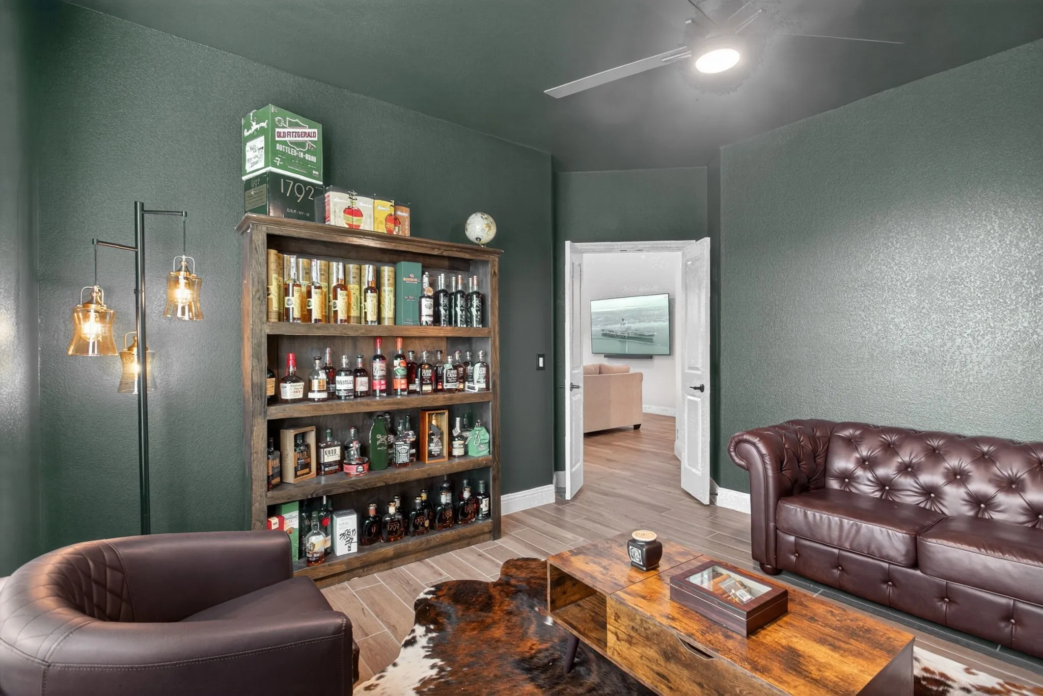 This room is located right off the living and kitchen areas - color drenched and fabulous.