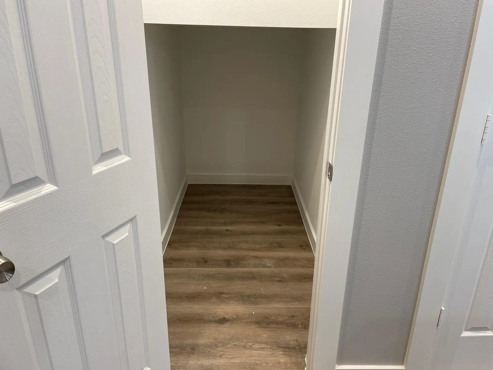 Storage in this well-appointed closet Under the stairs